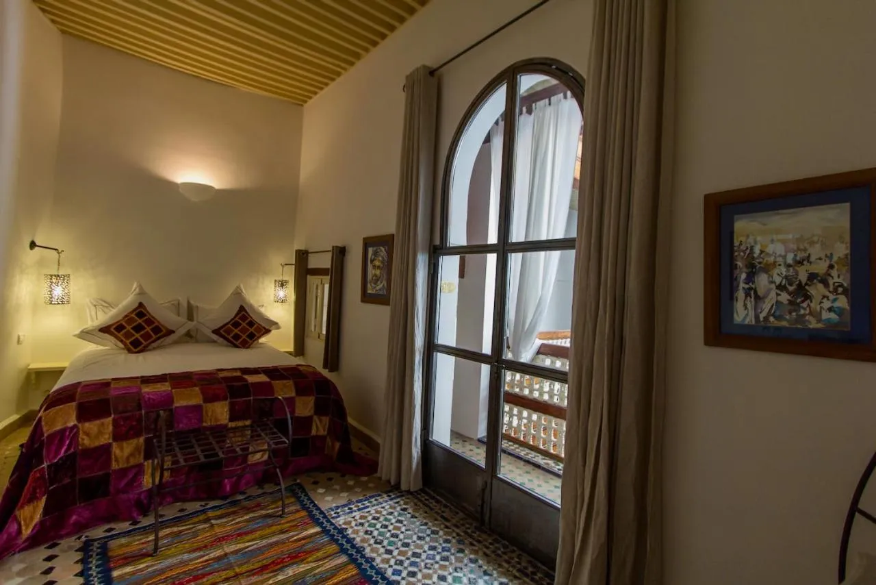 Bed in Riad Laaroussa