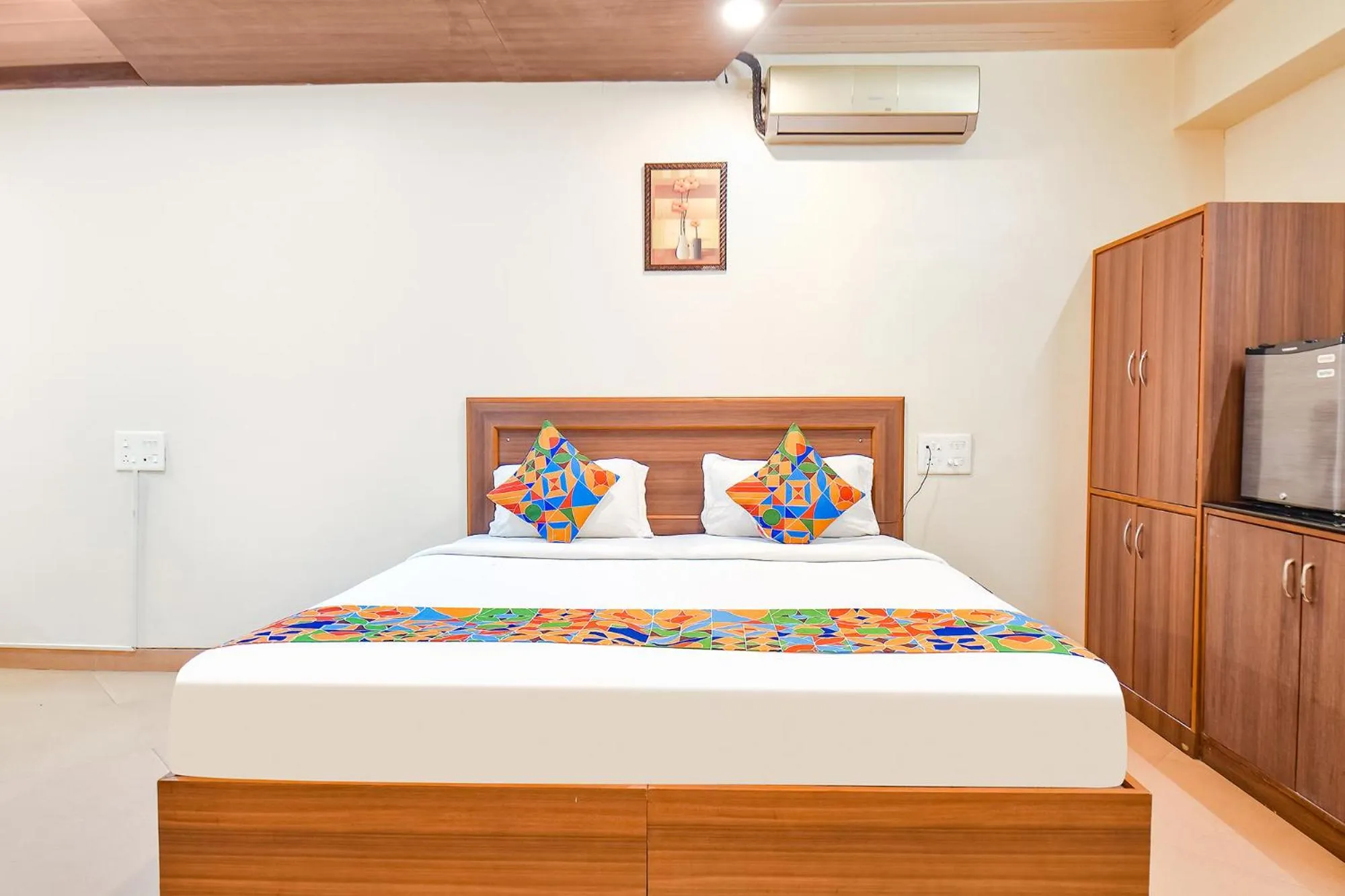 Bed in FabHotel Shreeyash Residency - Nr Spine City Mall