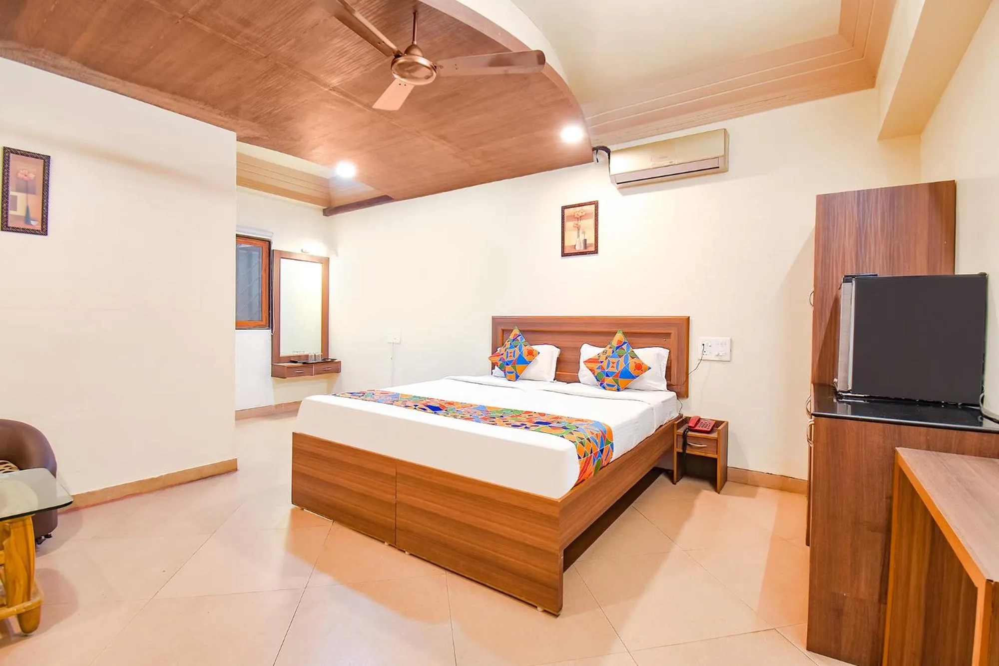 Bed in FabHotel Shreeyash Residency - Nr Spine City Mall