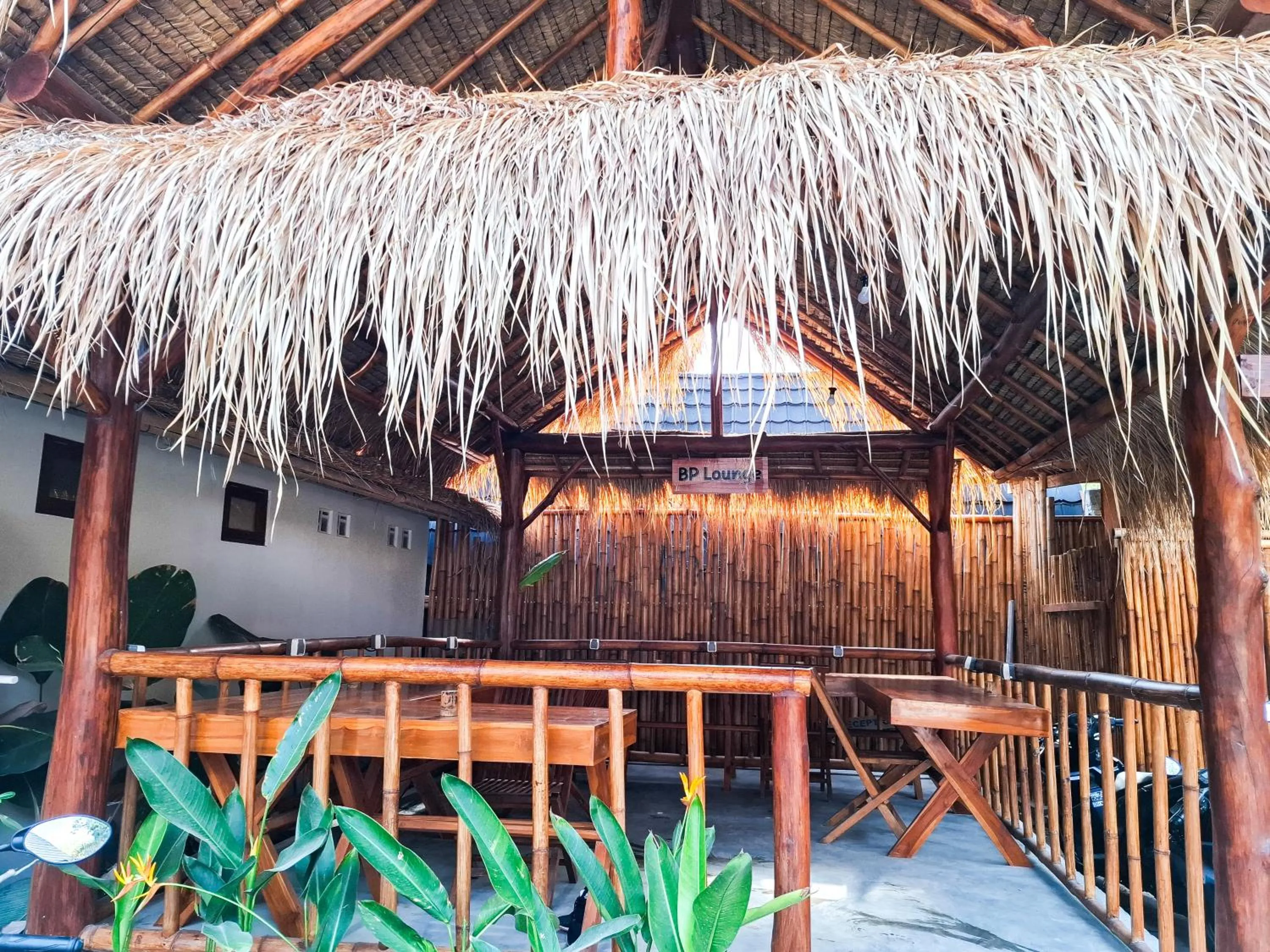 Communal lounge/ TV room in RaCottage Mandalika