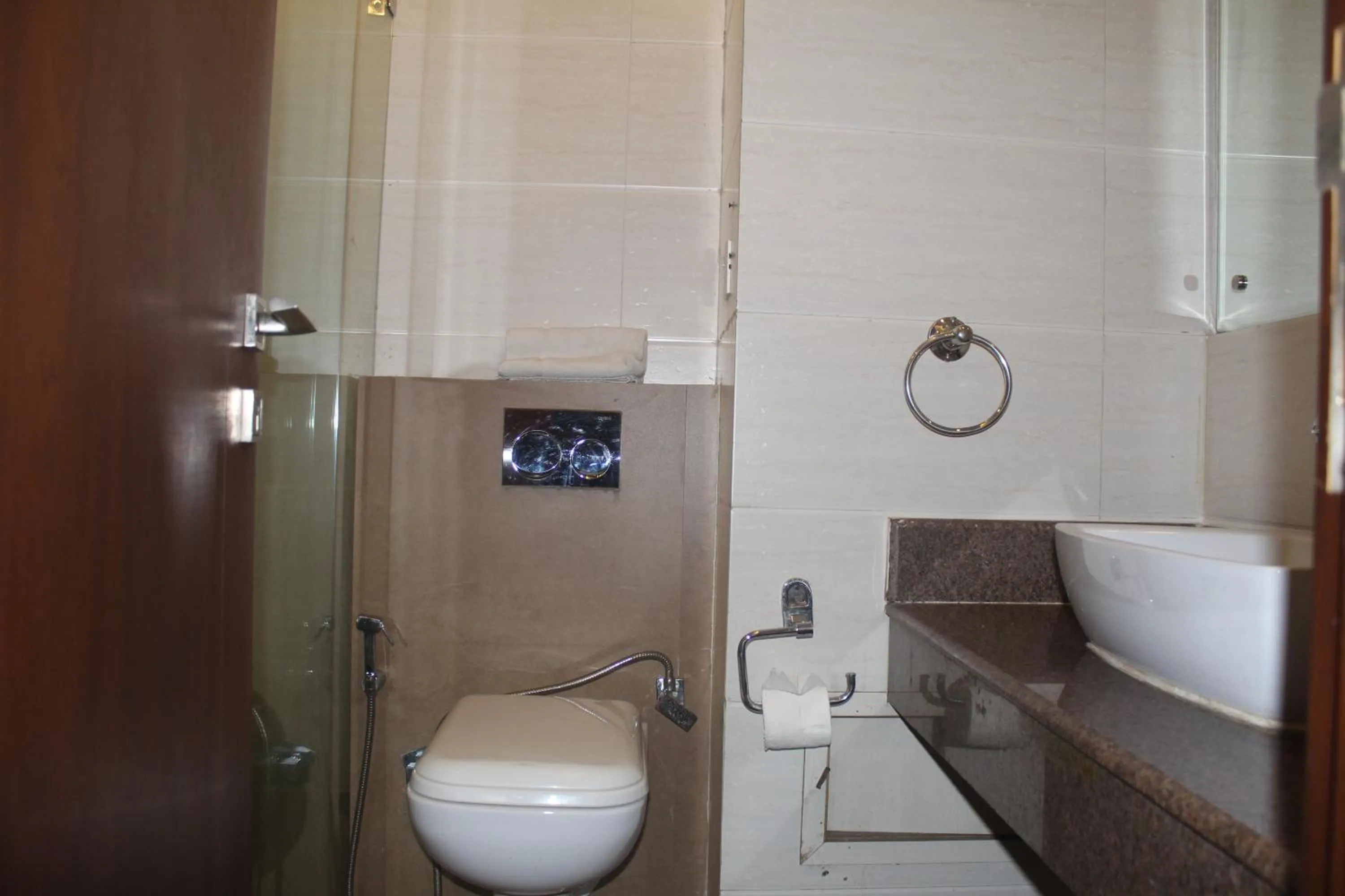 Toilet in THE J K Hotel C R Park