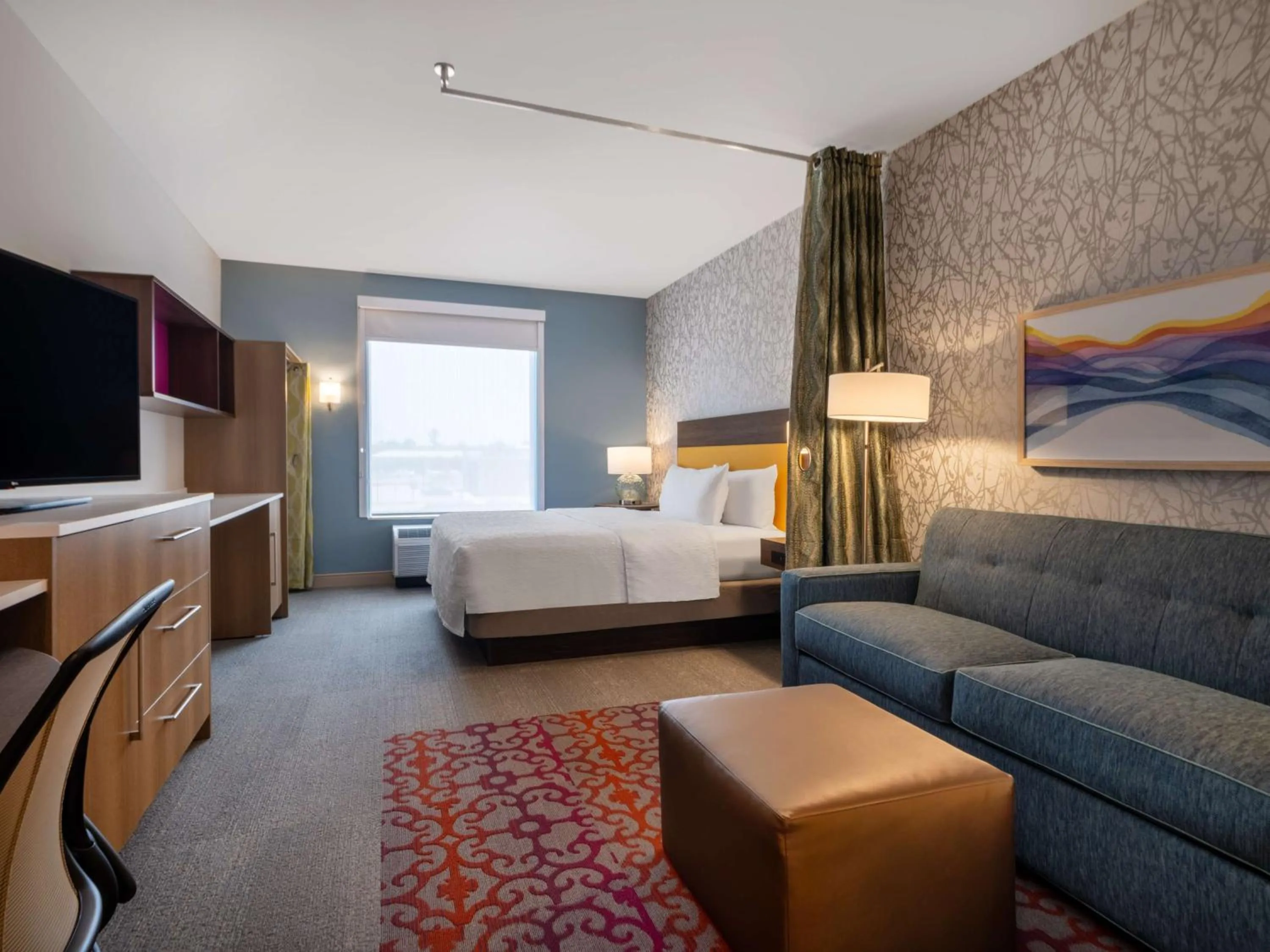 Living room, Bed in Home2 Suites By Hilton Santa Rosa Beach