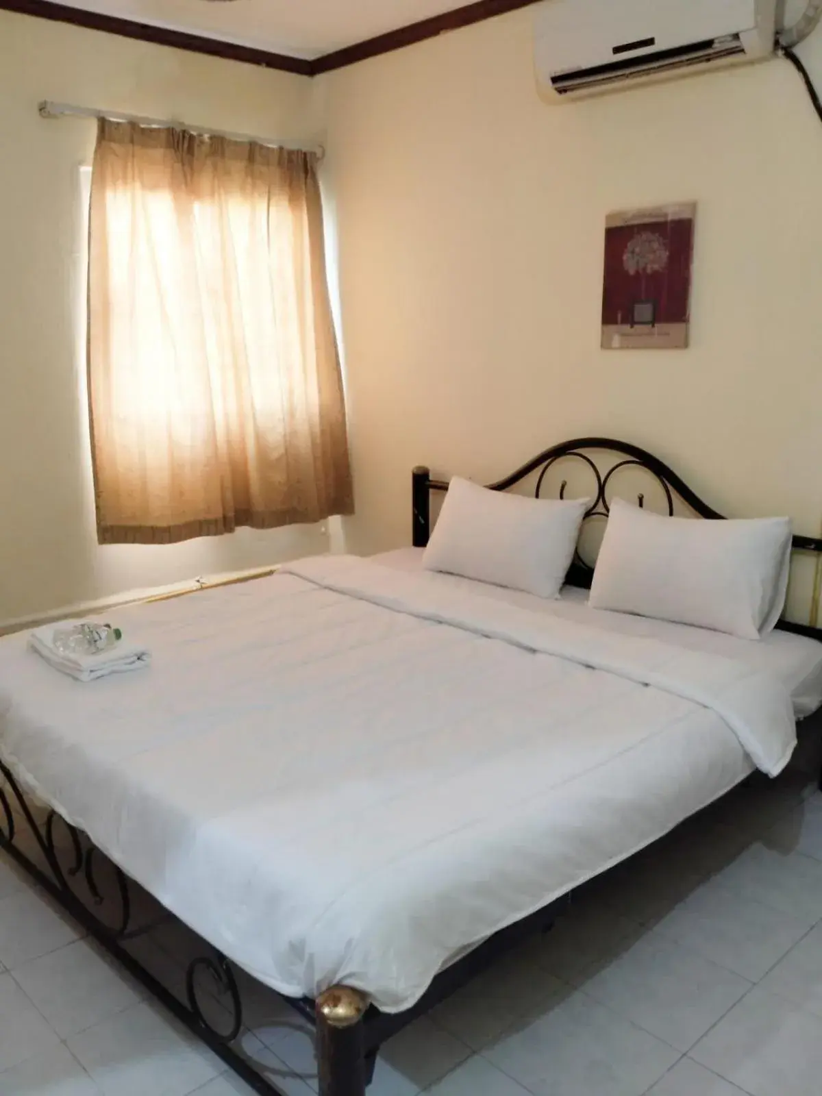 Bed in Rainbow Hotel Vientiane Bed in Rainbow Hotel Vientiane