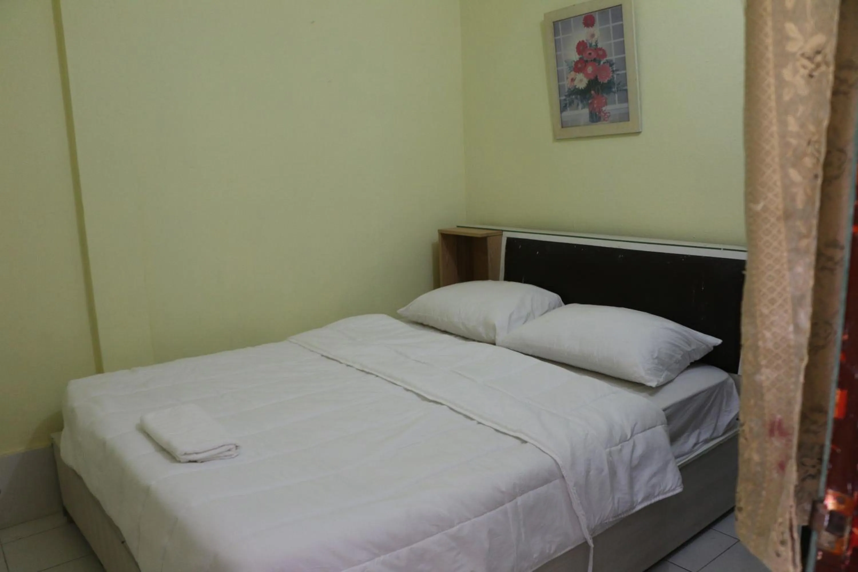 Bed in Rainbow Hotel Vientiane