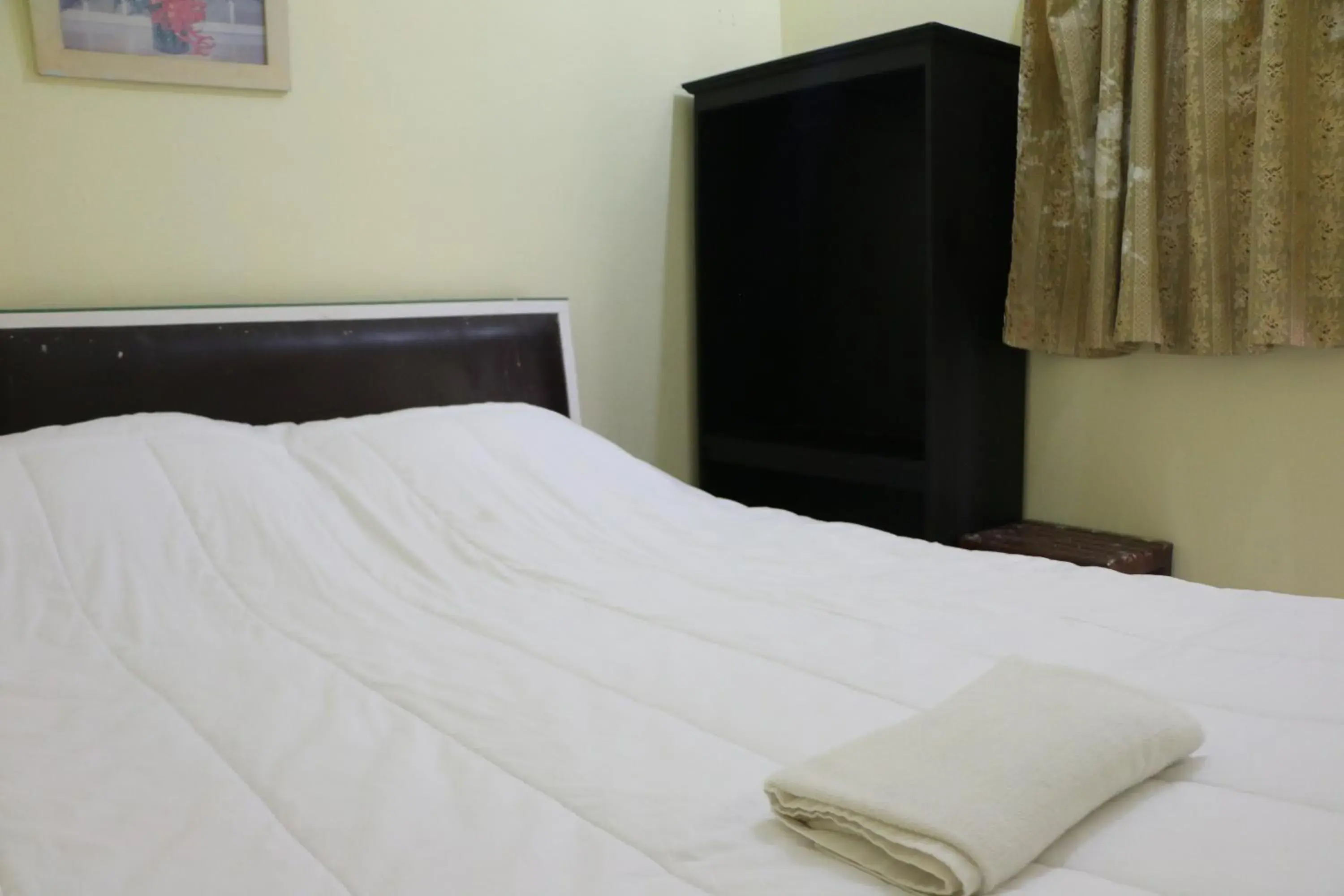 Bed in Rainbow Hotel Vientiane Bed in Rainbow Hotel Vientiane