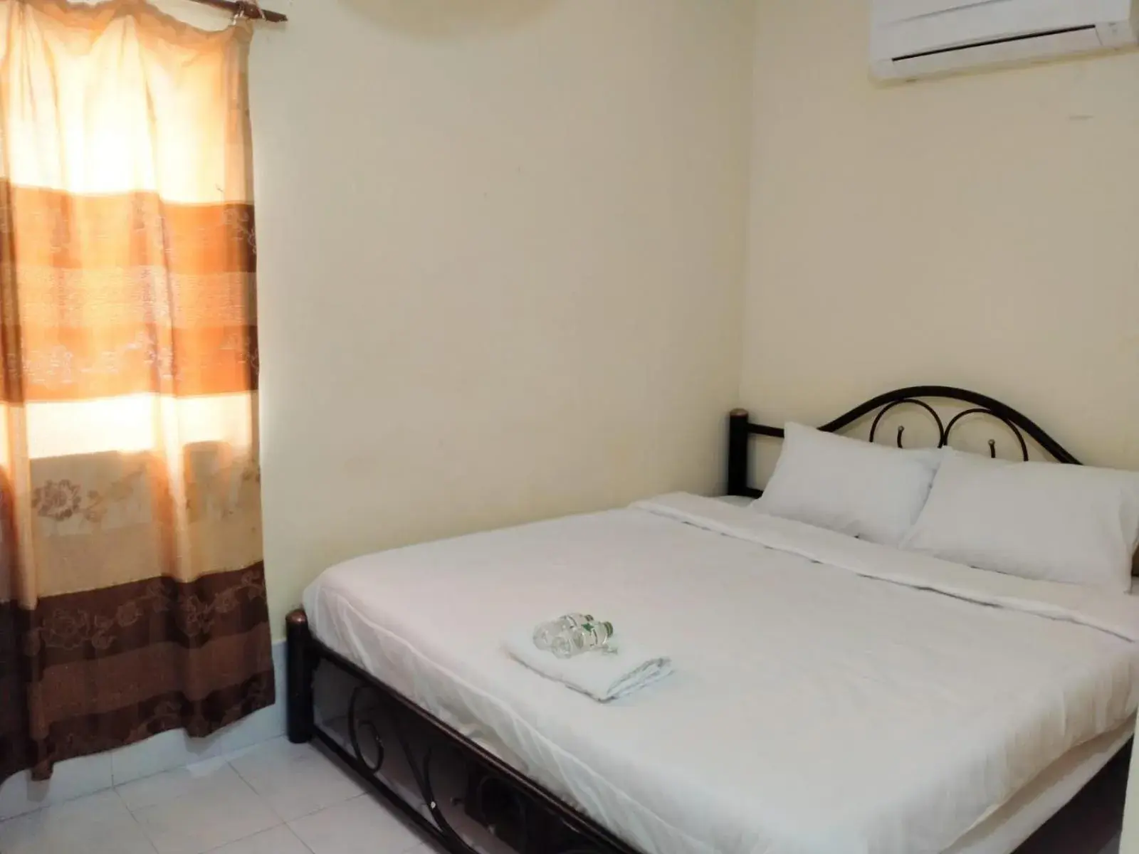 Bed in Rainbow Hotel Vientiane Bed in Rainbow Hotel Vientiane