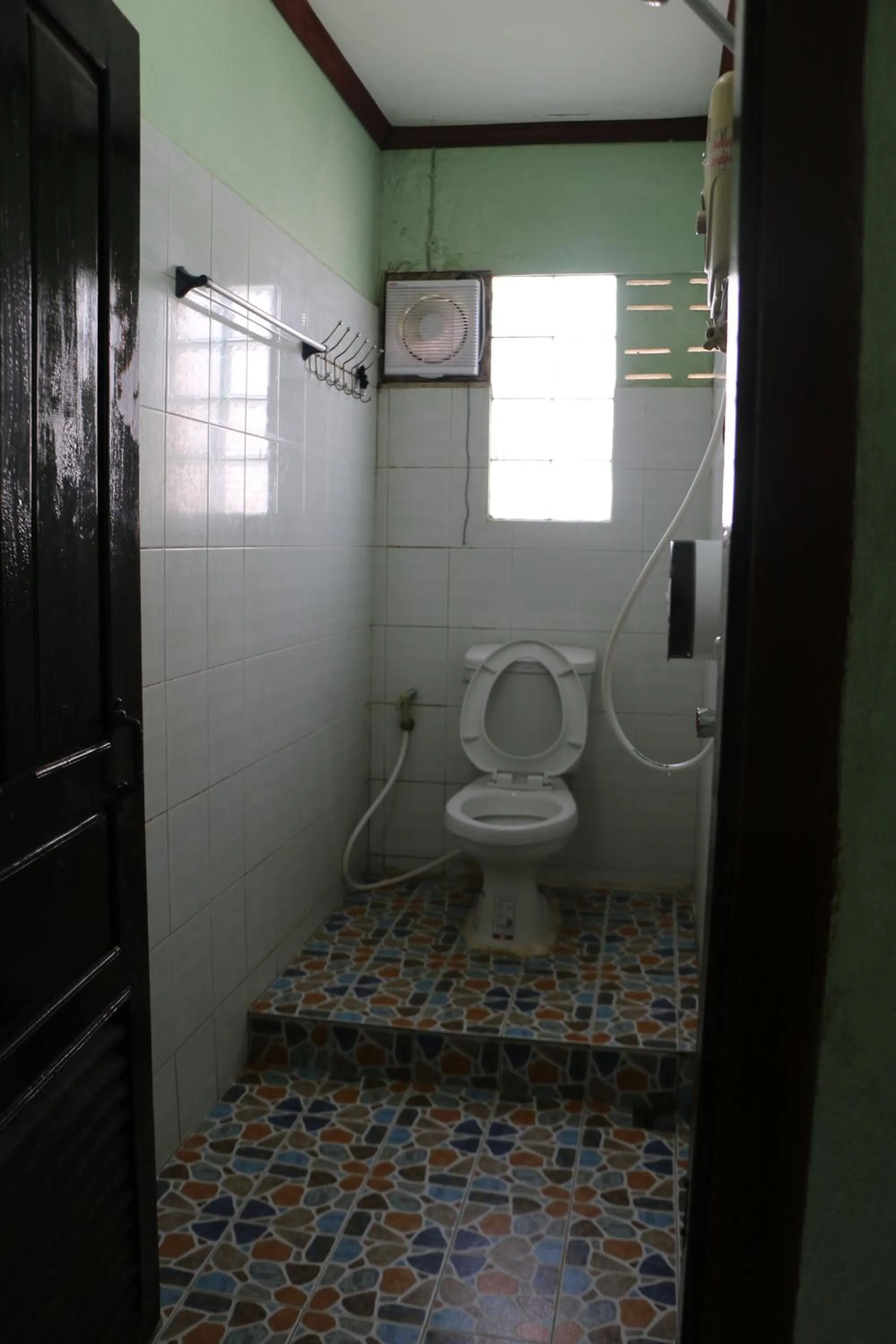 Toilet in Rainbow Hotel Vientiane