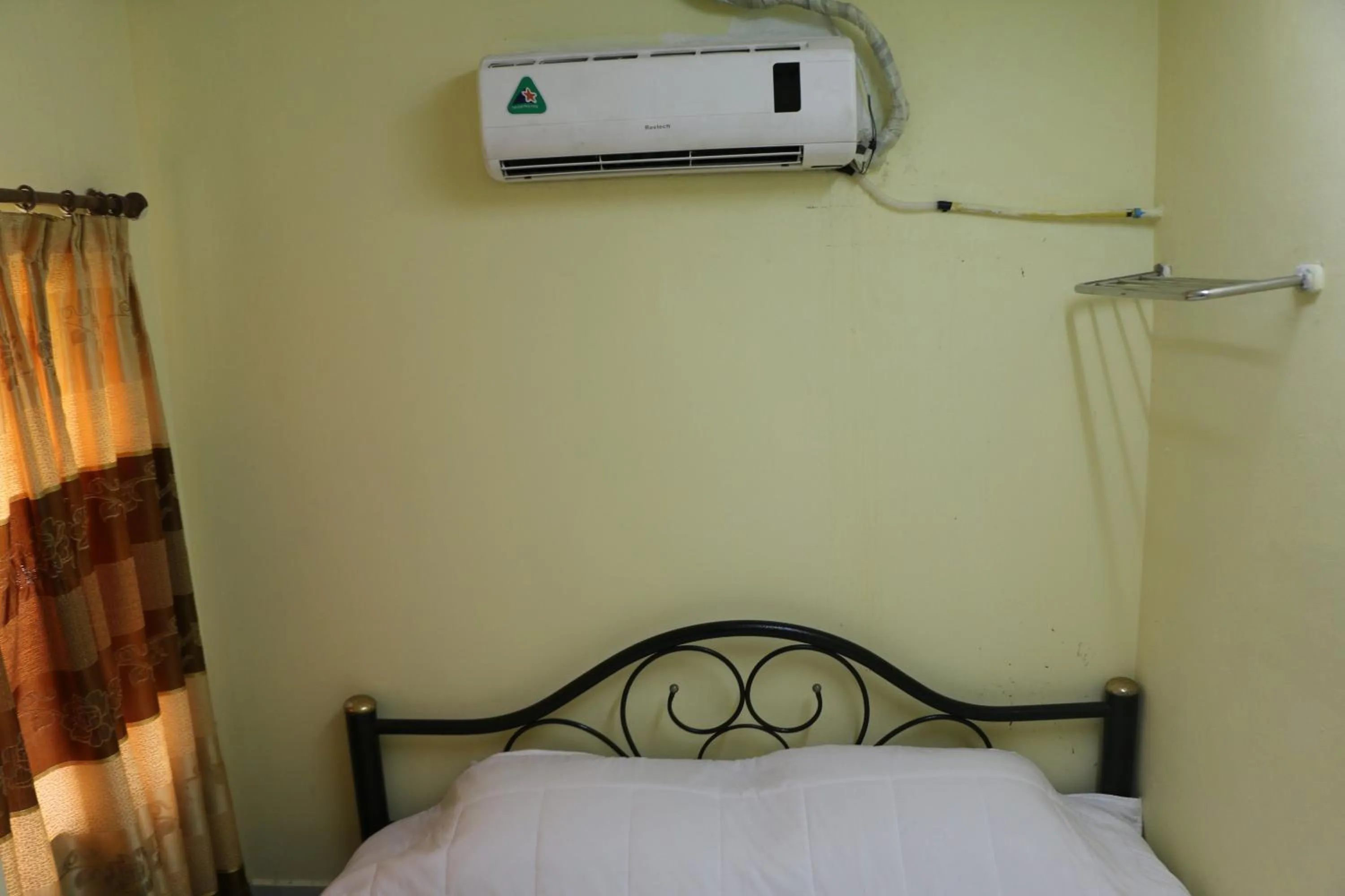 Bed in Rainbow Hotel Vientiane