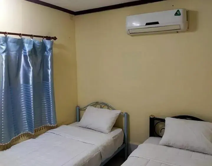 Bed in Rainbow Hotel Vientiane Bed in Rainbow Hotel Vientiane