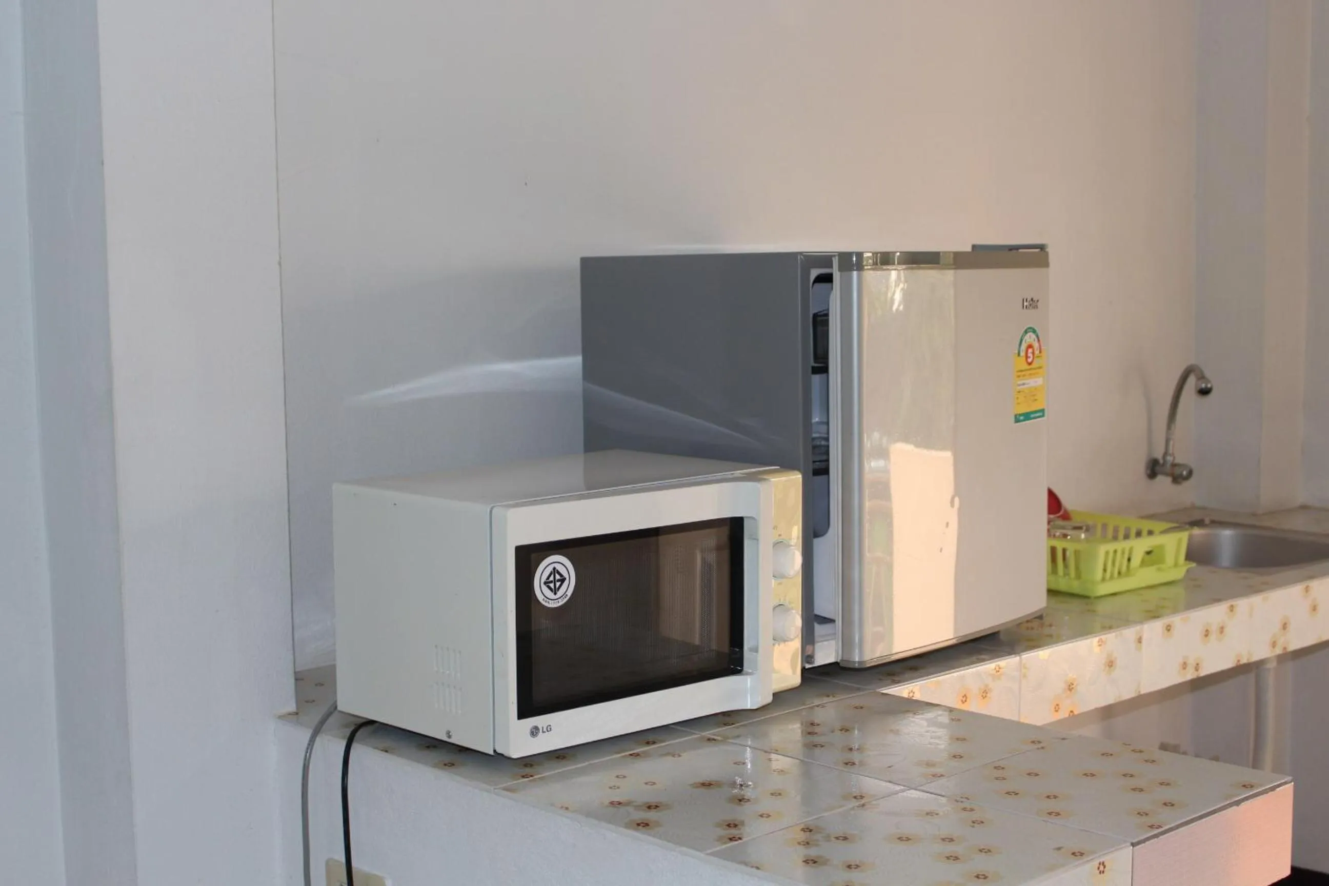 Bedroom in OYO 75420 Howto Hotel