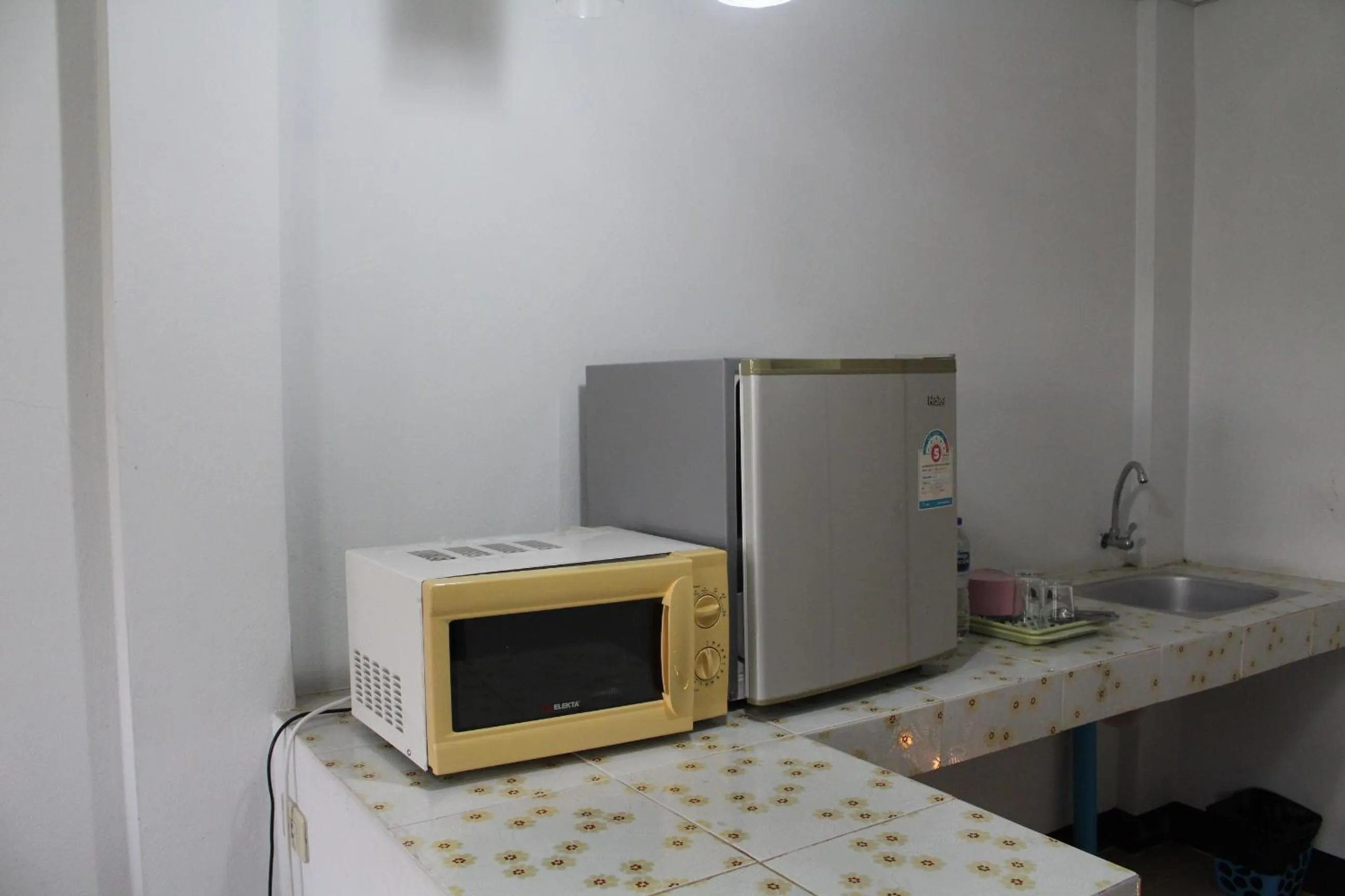 Bedroom in OYO 75420 Howto Hotel