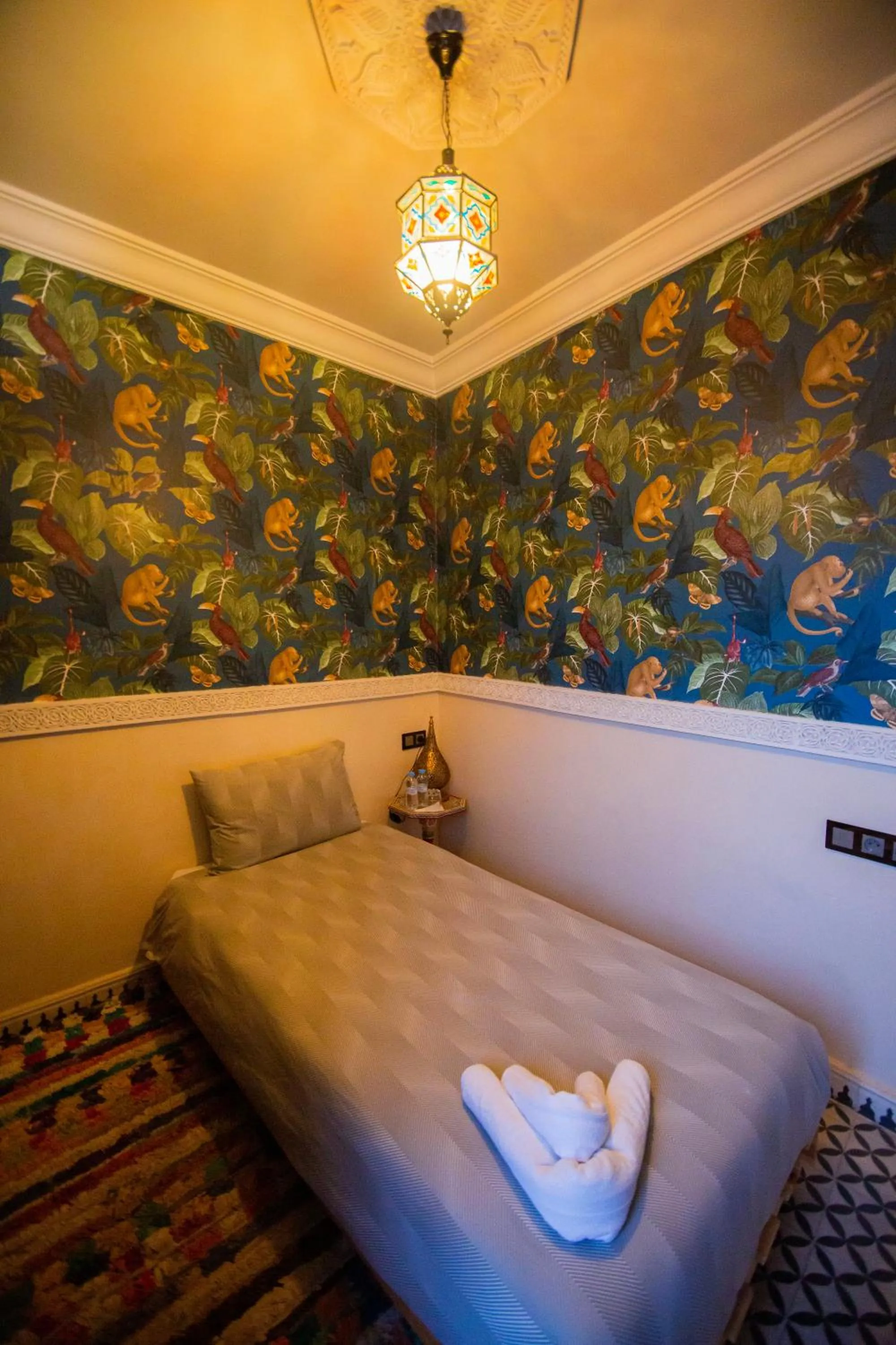 Bed in Riad Ta'achchaqa