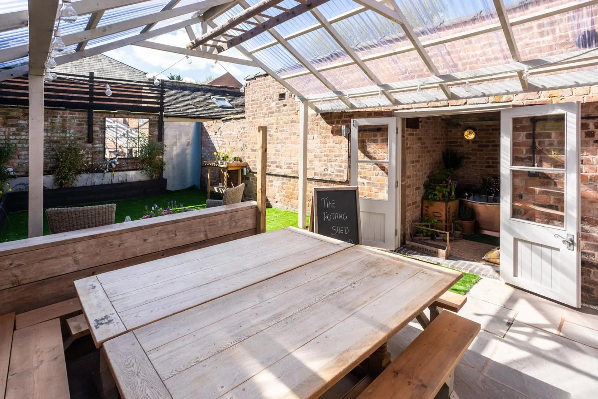Patio in The Walled Garden at Cheshire Boutique Bathhouse