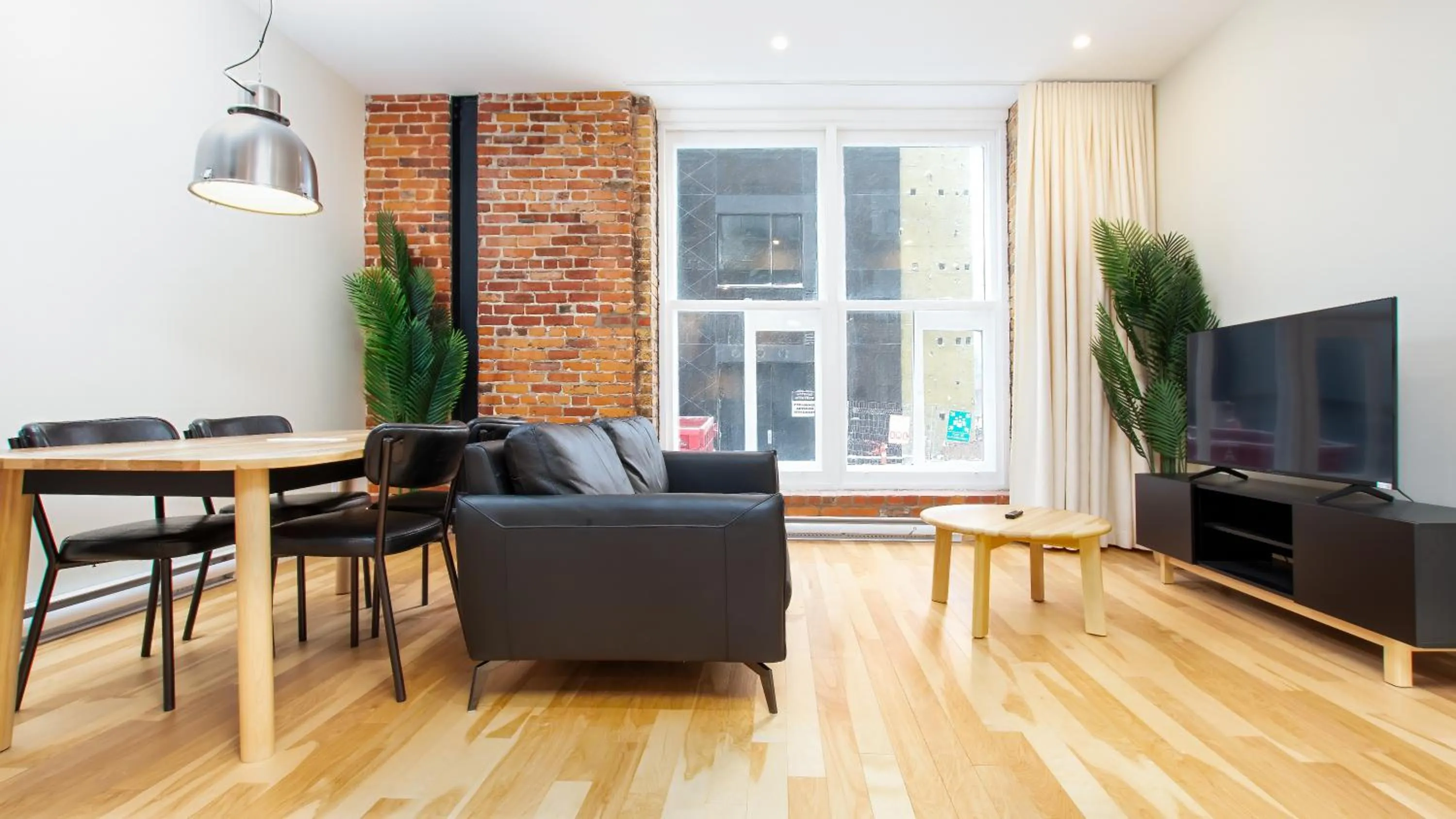 Communal lounge/ TV room in Les Lofts de la Barricade - Par les Lofts Vieux-Québec