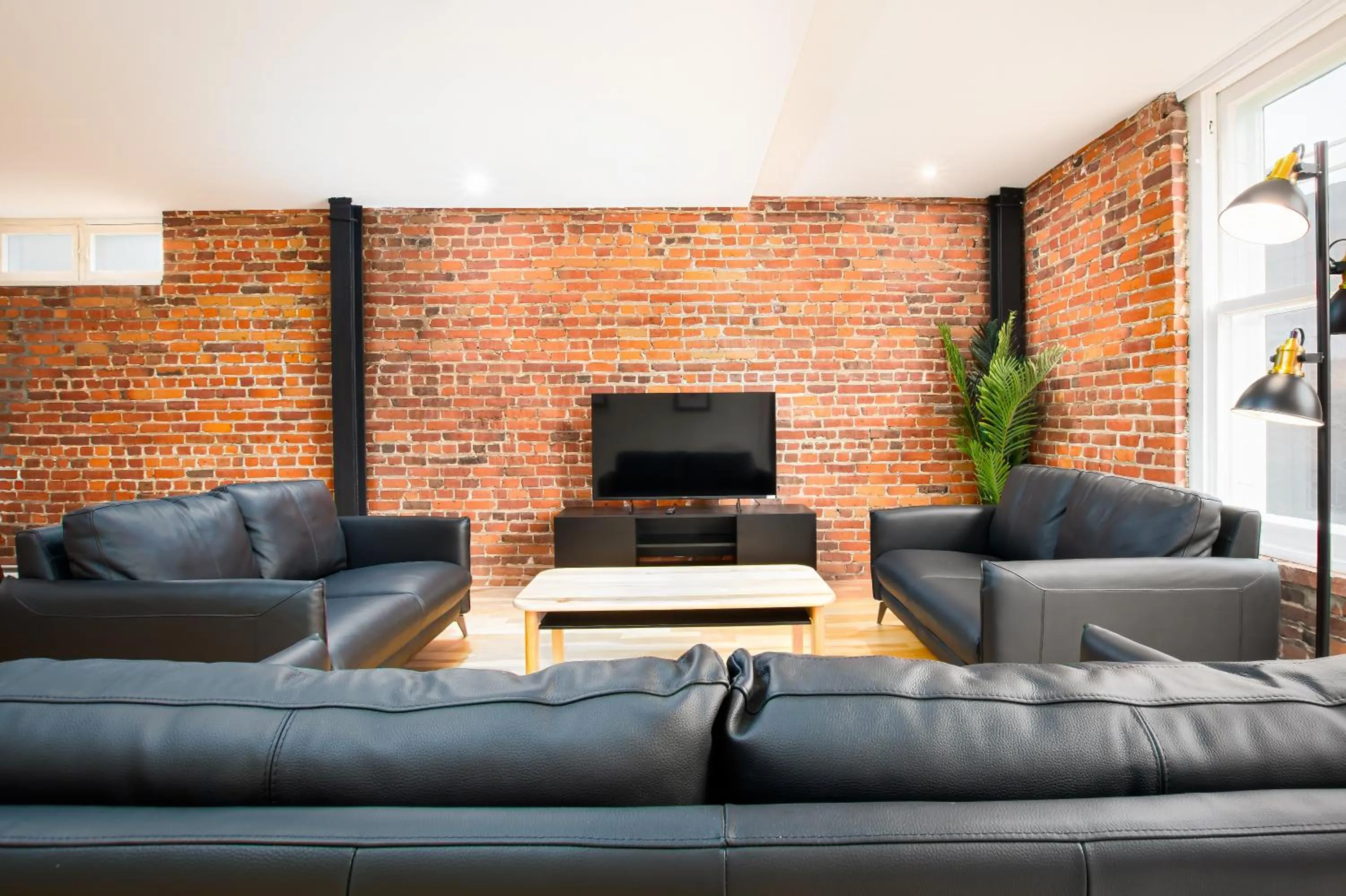 Communal lounge/ TV room in Les Lofts de la Barricade - Par les Lofts Vieux-Québec
