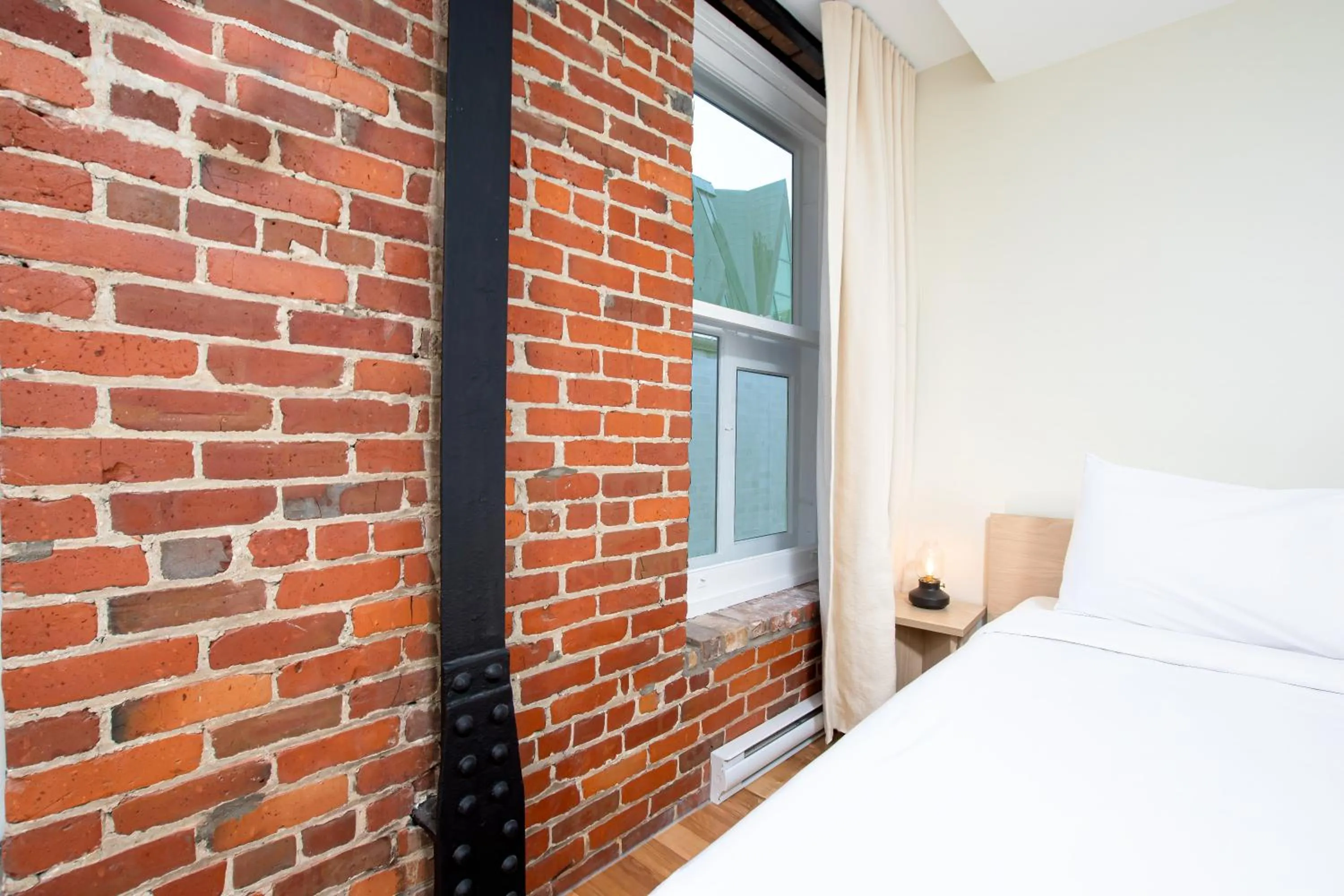 Bed in Les Lofts de la Barricade - Par les Lofts Vieux-Québec