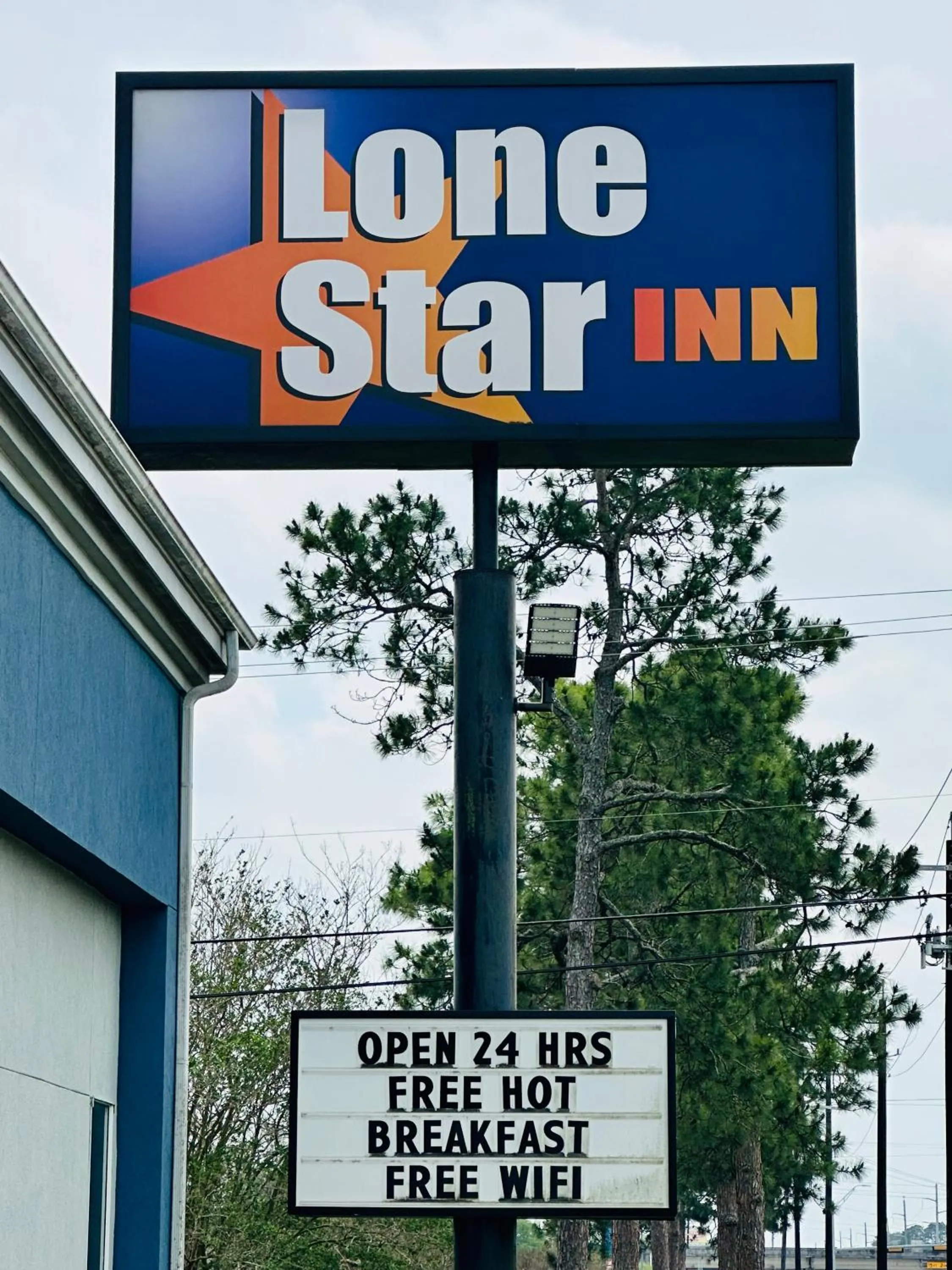 Property logo or sign in Lonestar Inn