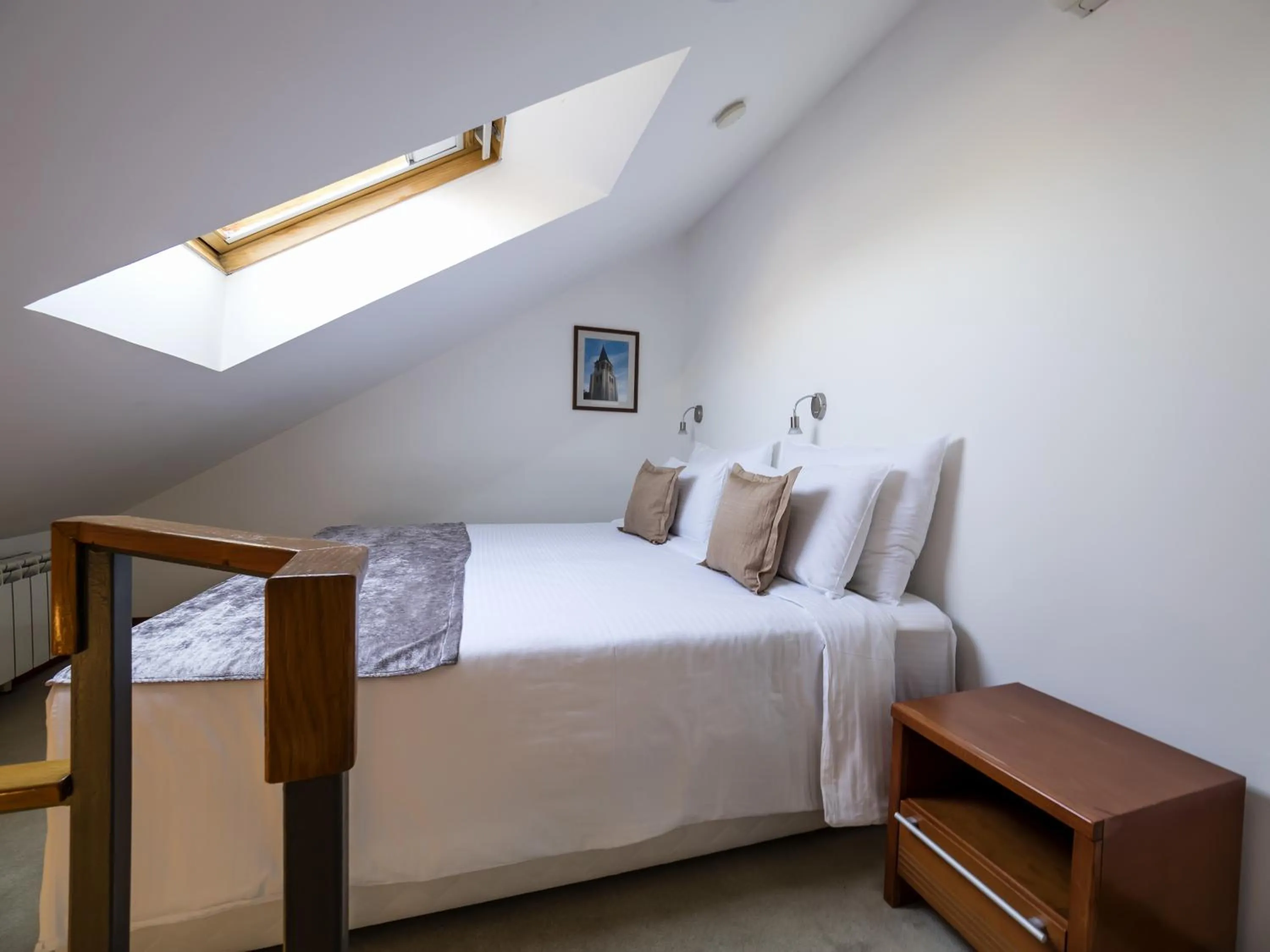 Bed in Garni Hotel Le Petit Piaf