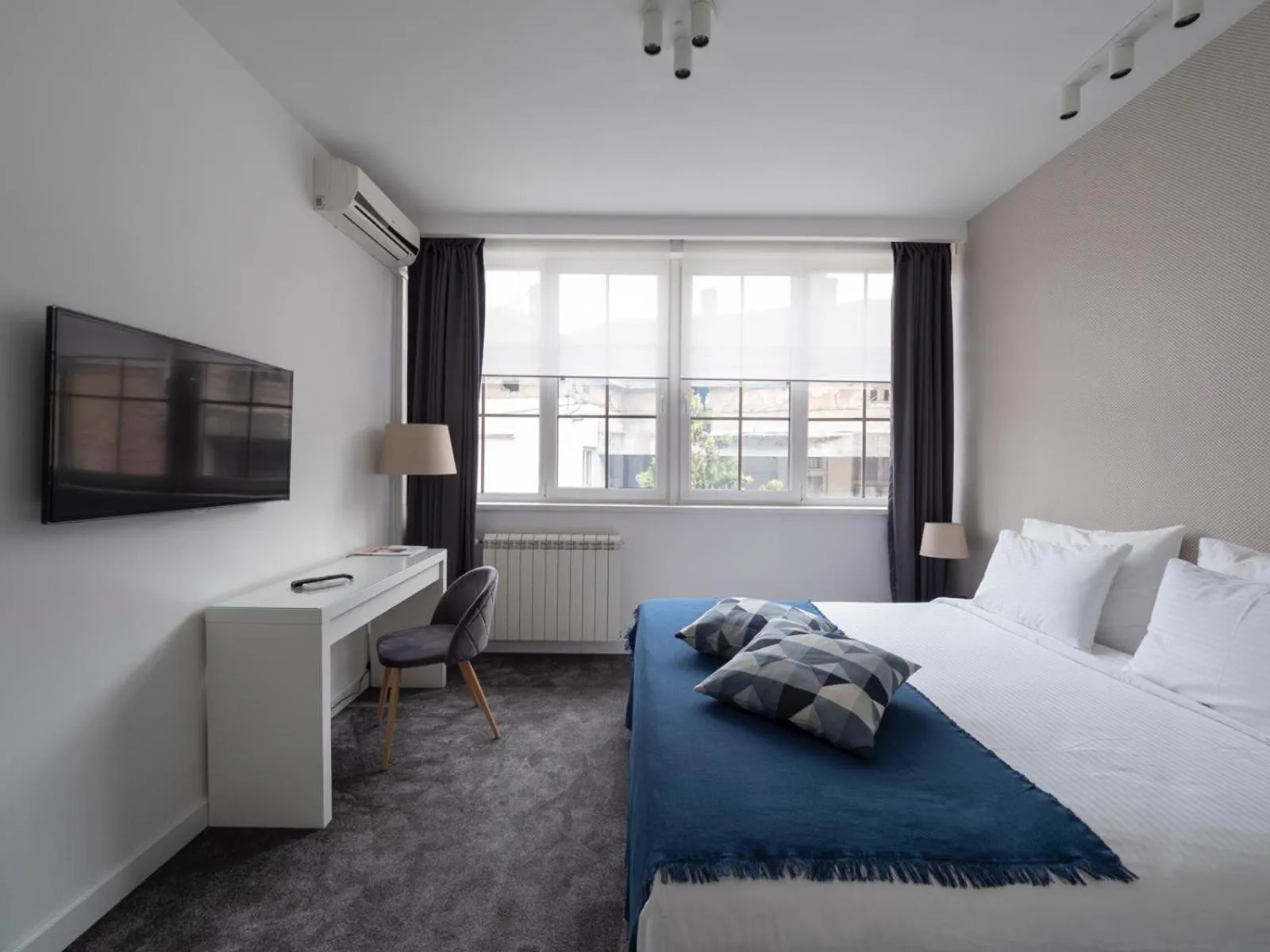 Photo of the whole room, Bed in Garni Hotel Le Petit Piaf