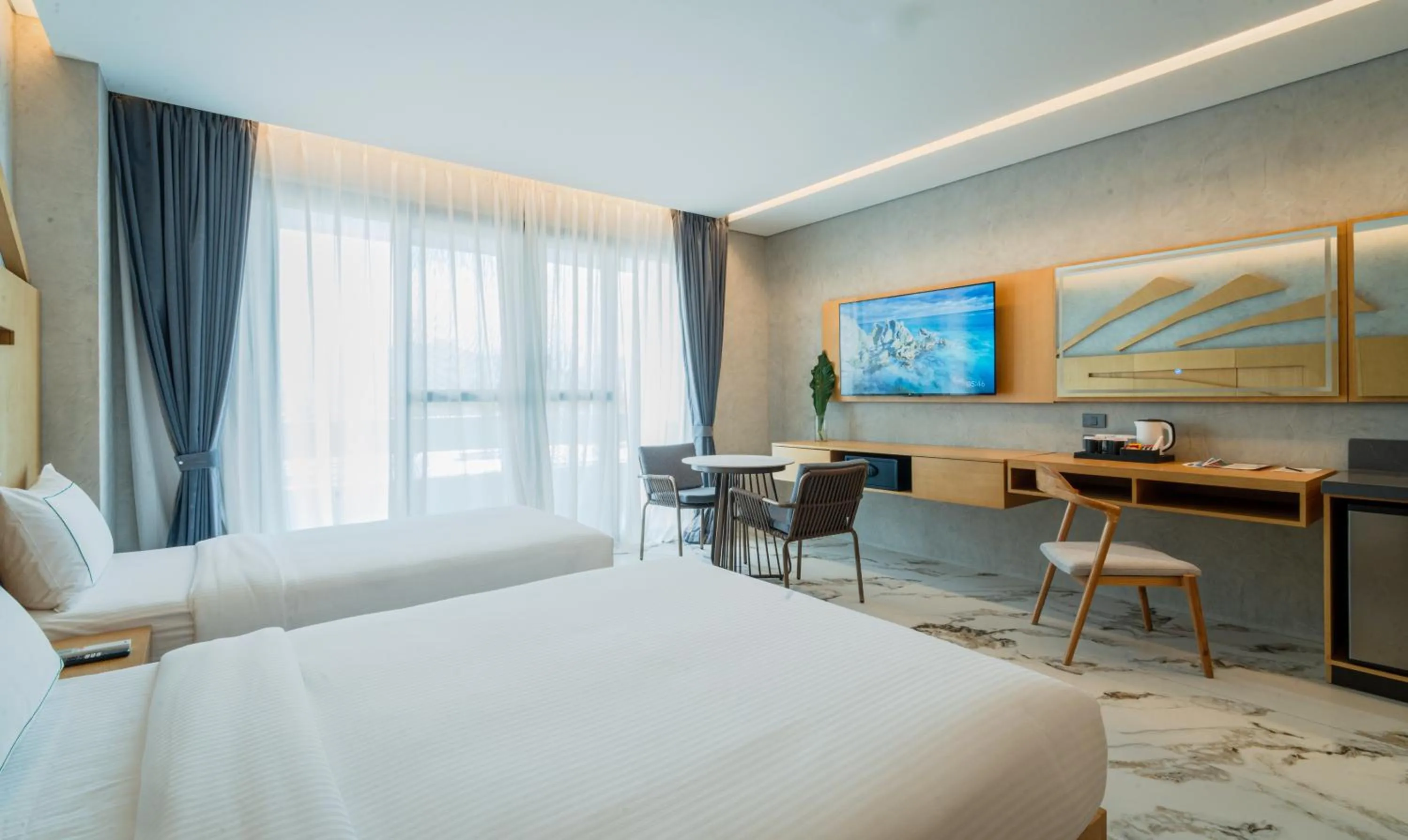 Bed in The Hotel Elizabeth Resort and Villas - Long Beach San Vicente Palawan