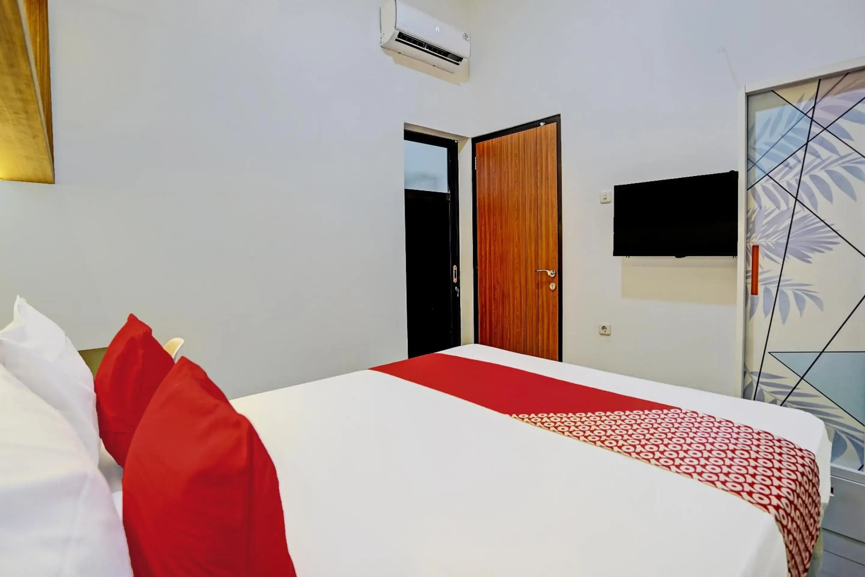 Bedroom in Hotel O Sunlo Cozy Home Family Homestay Syariah Bedroom in Hotel O Sunlo Cozy Home Family Homestay Syariah