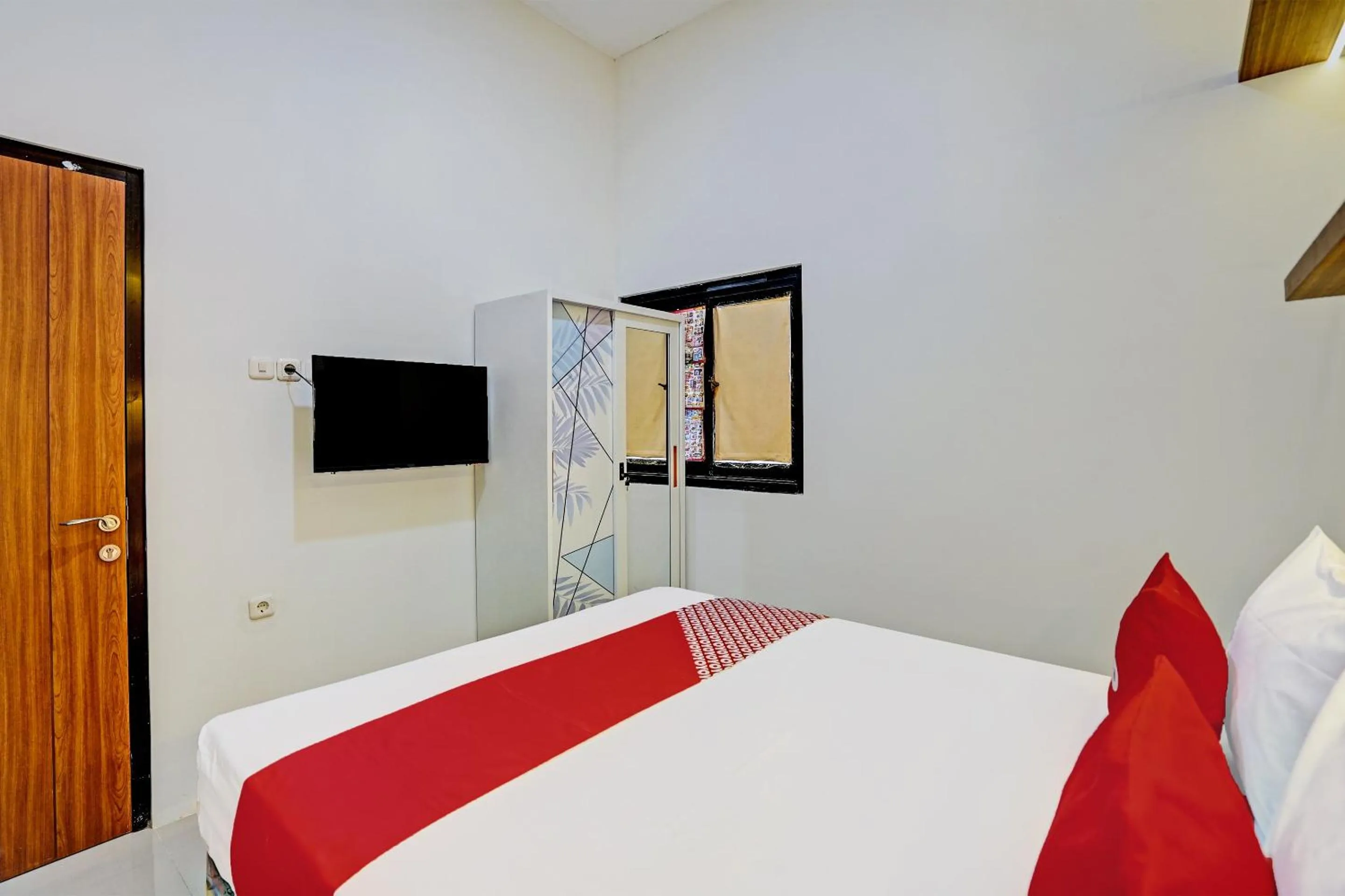 Bedroom in Hotel O Sunlo Cozy Home Family Homestay Syariah