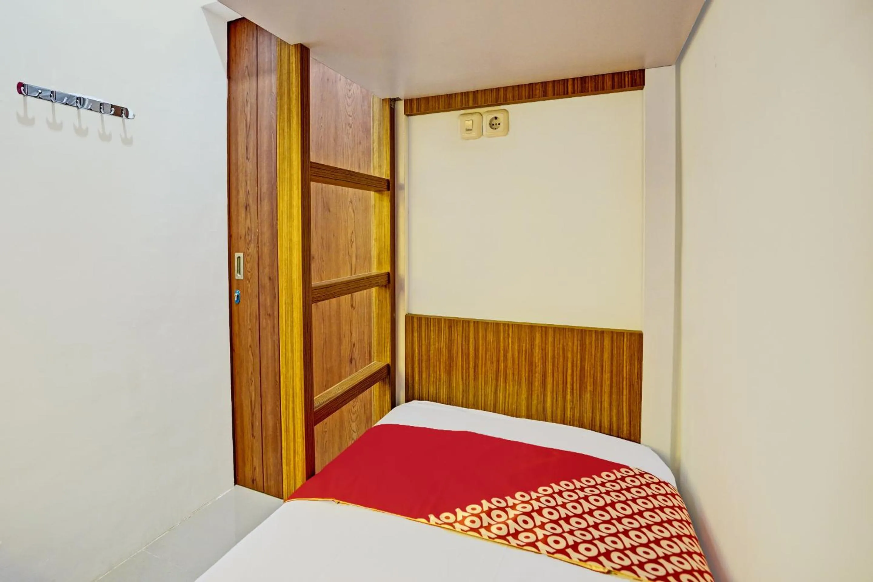 Bedroom in Hotel O Sunlo Cozy Home Family Homestay Syariah