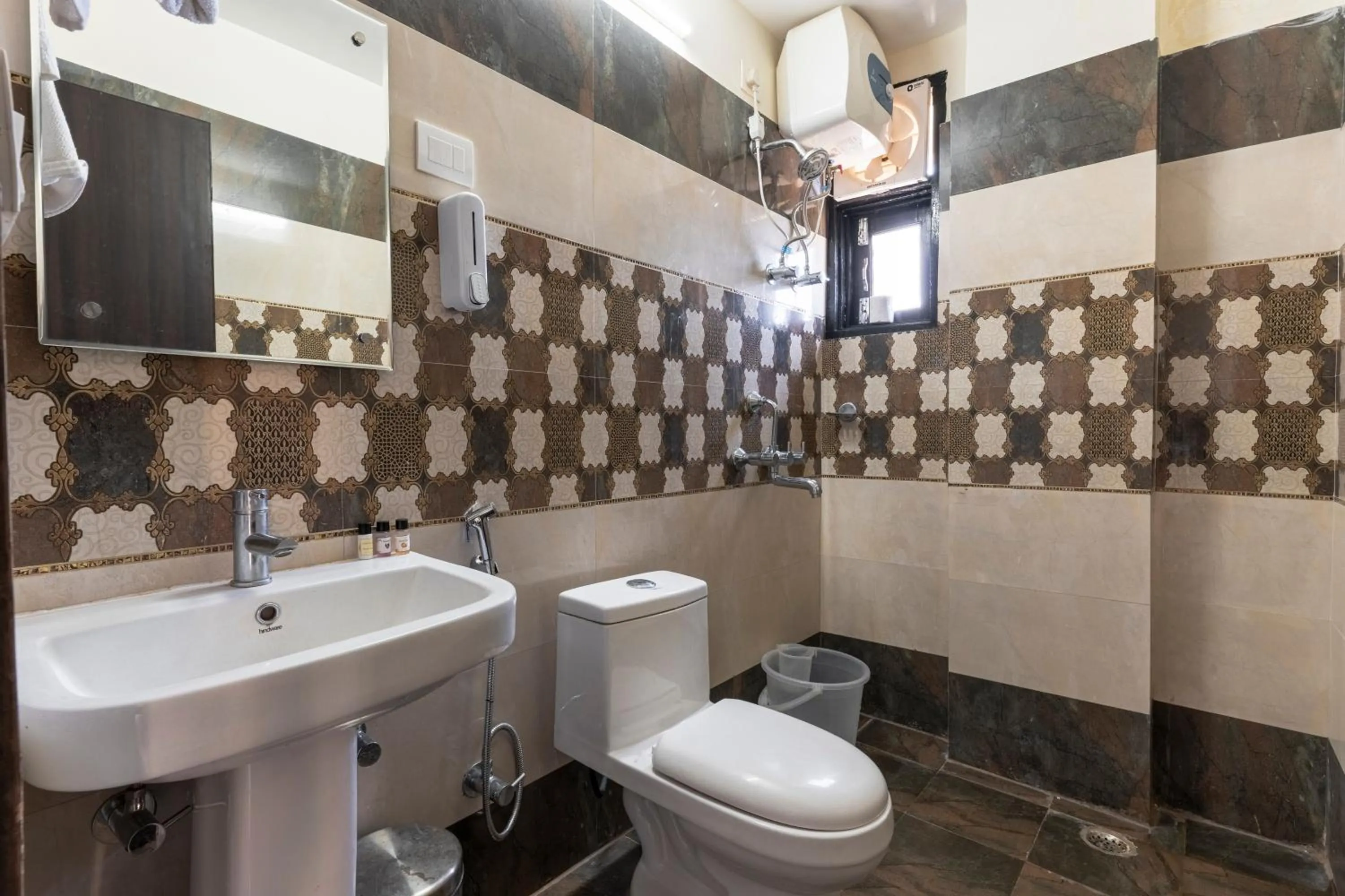 Toilet in Viable Inn by Vista Stays