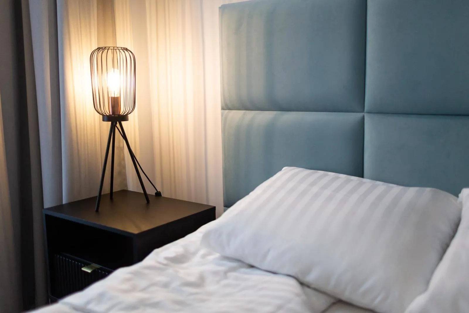 Bed in Moon Apartments Gdańsk