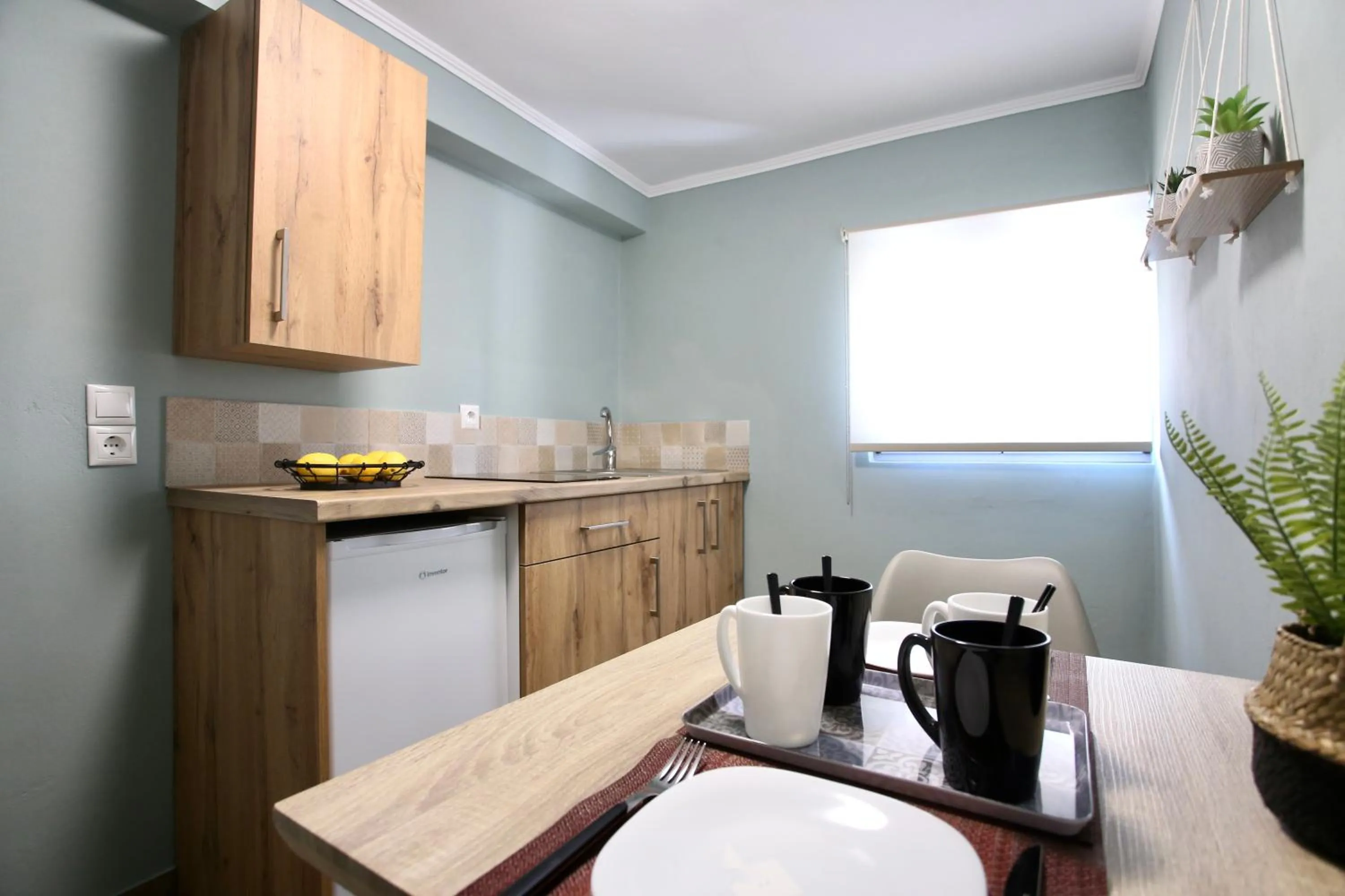 Kitchen or kitchenette in GK Mediterranean Village - Airport Free Shuttle by GK Properties