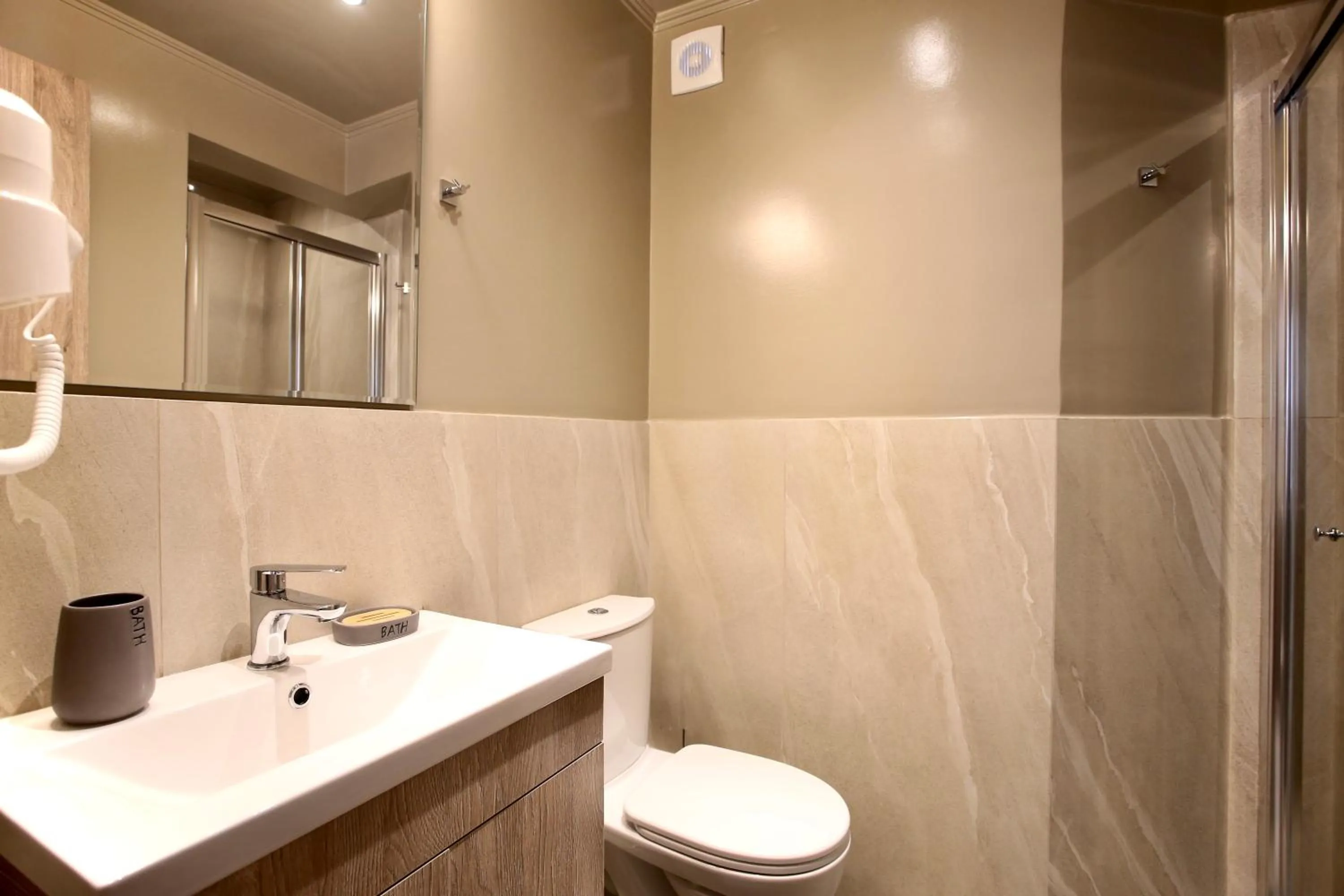 Bathroom in GK Mediterranean Village - Airport Free Shuttle by GK Properties