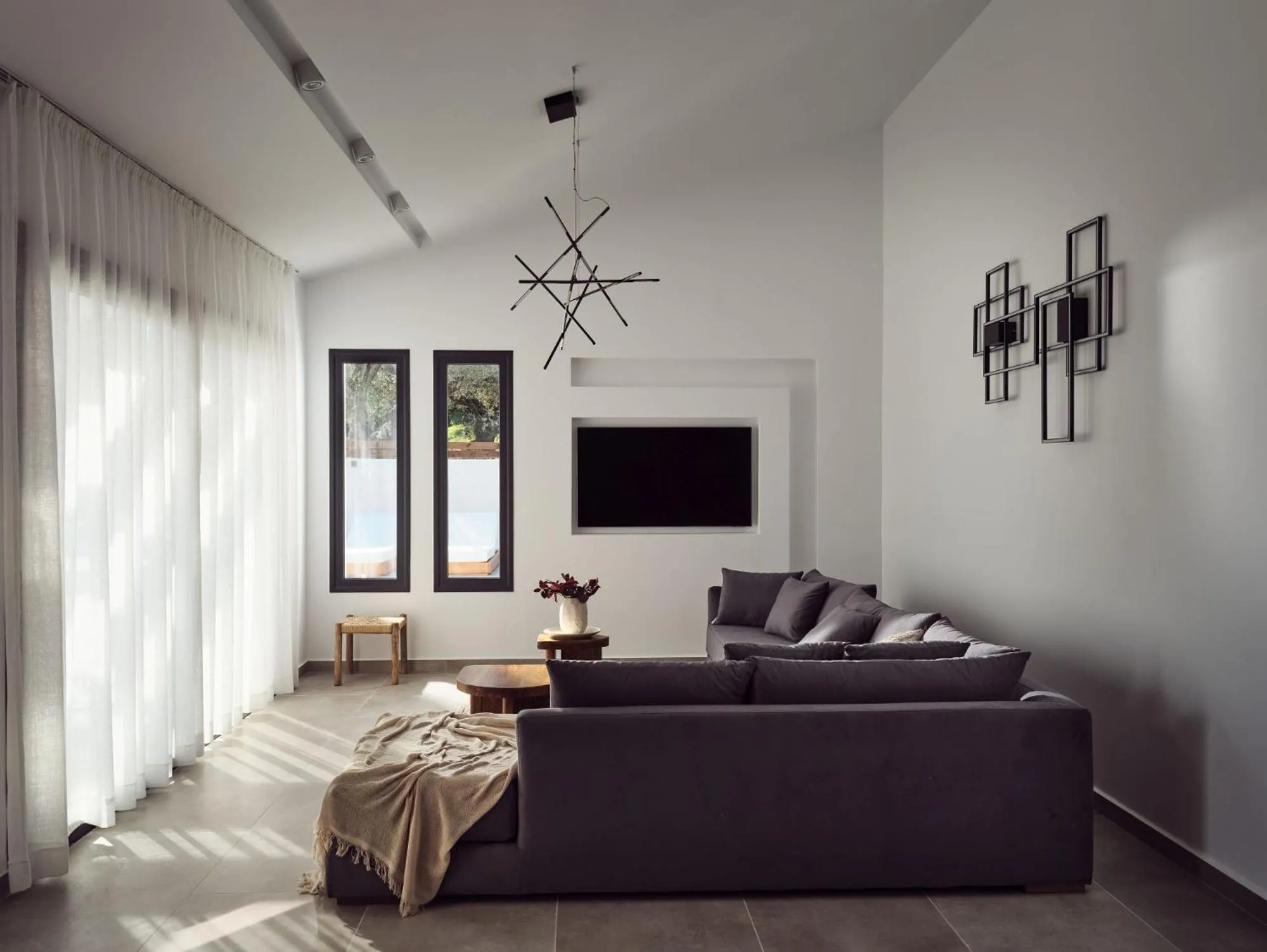 Living room in Estelle Villa, a Flamboyant Escape with Pool, By ThinkVilla