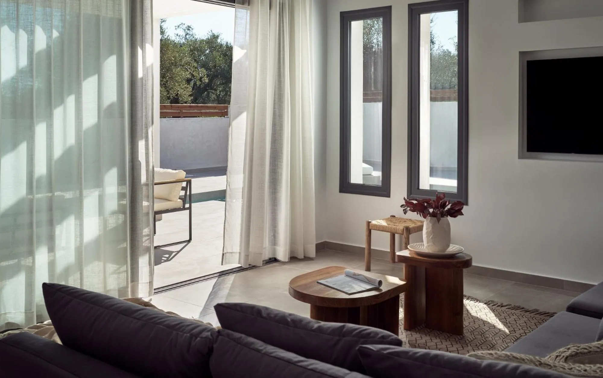 Living room in Estelle Villa, a Flamboyant Escape with Pool, By ThinkVilla