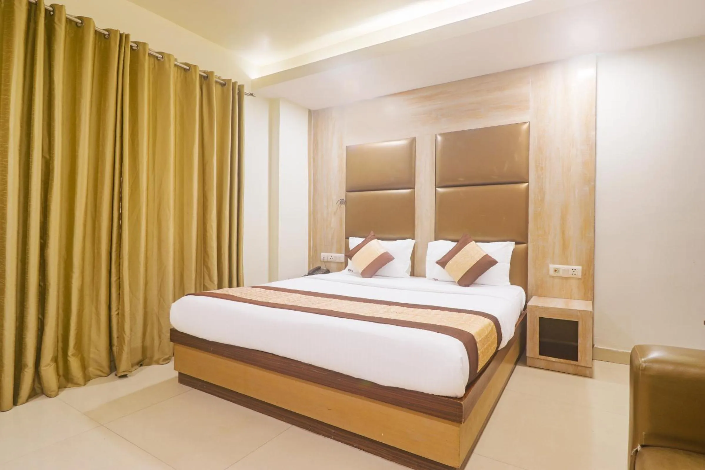 Bed in Hotel Sizzling Starr