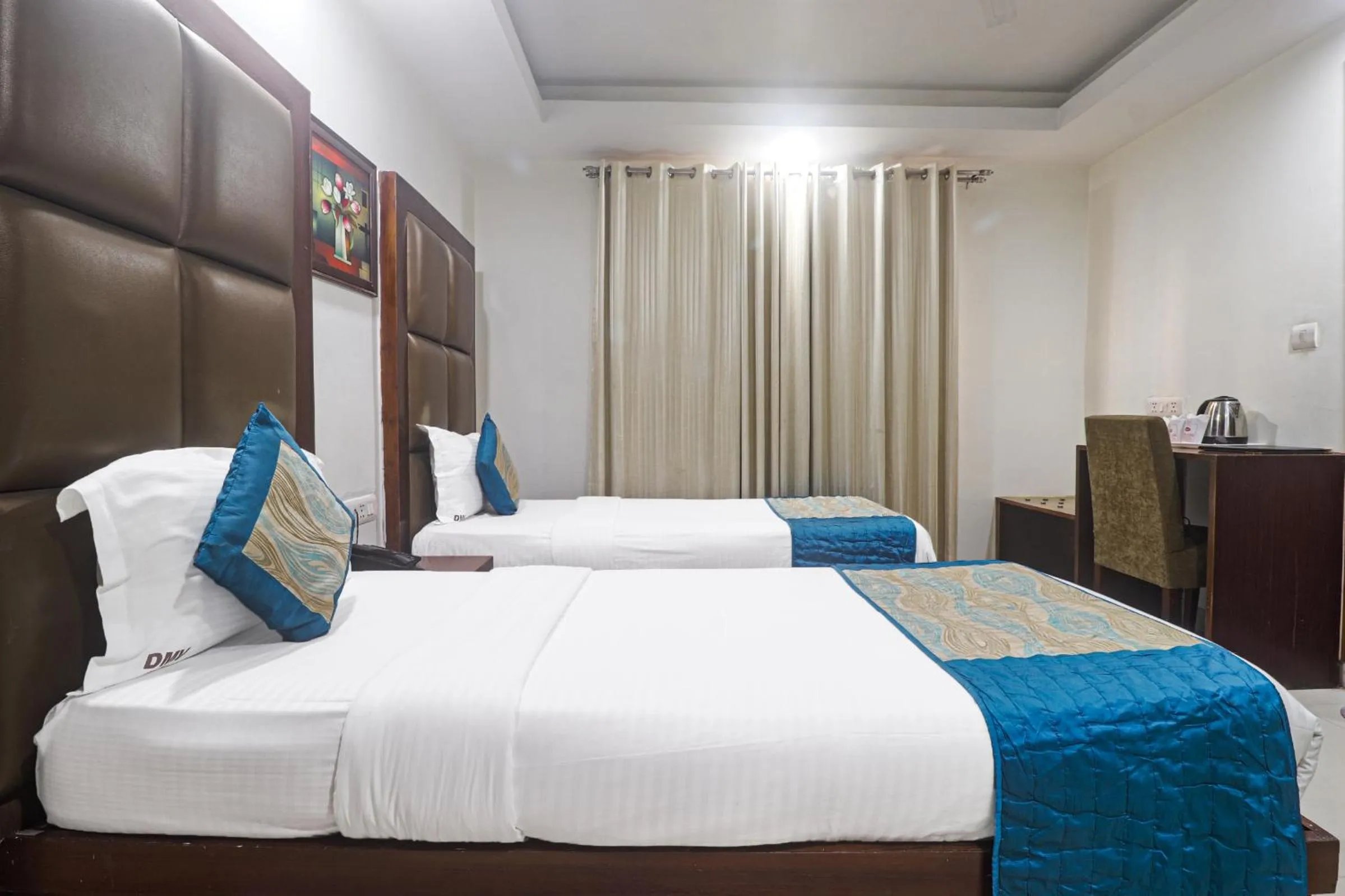 Bed in Hotel Sizzling Starr