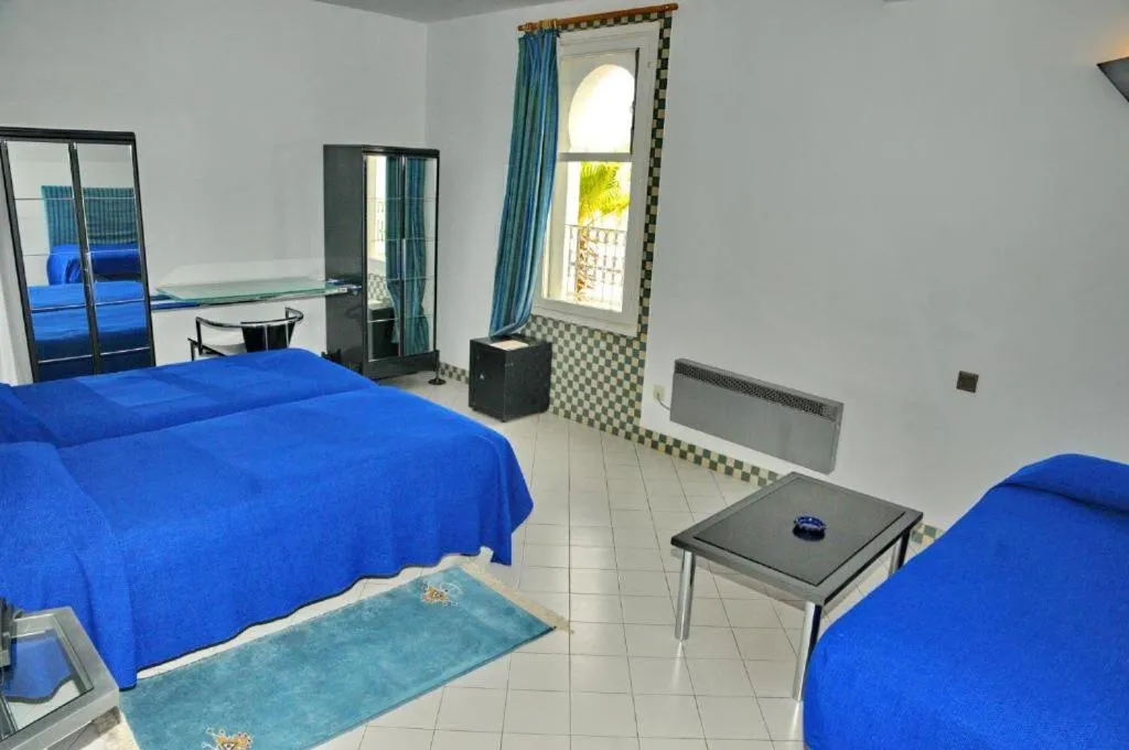 Bed in Appart-Hôtel Tagadirt