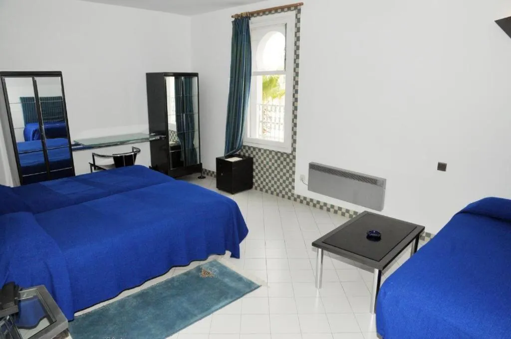 Bed in Appart-Hôtel Tagadirt