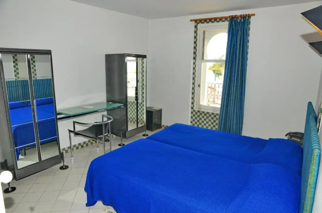 Bed in Appart-Hôtel Tagadirt