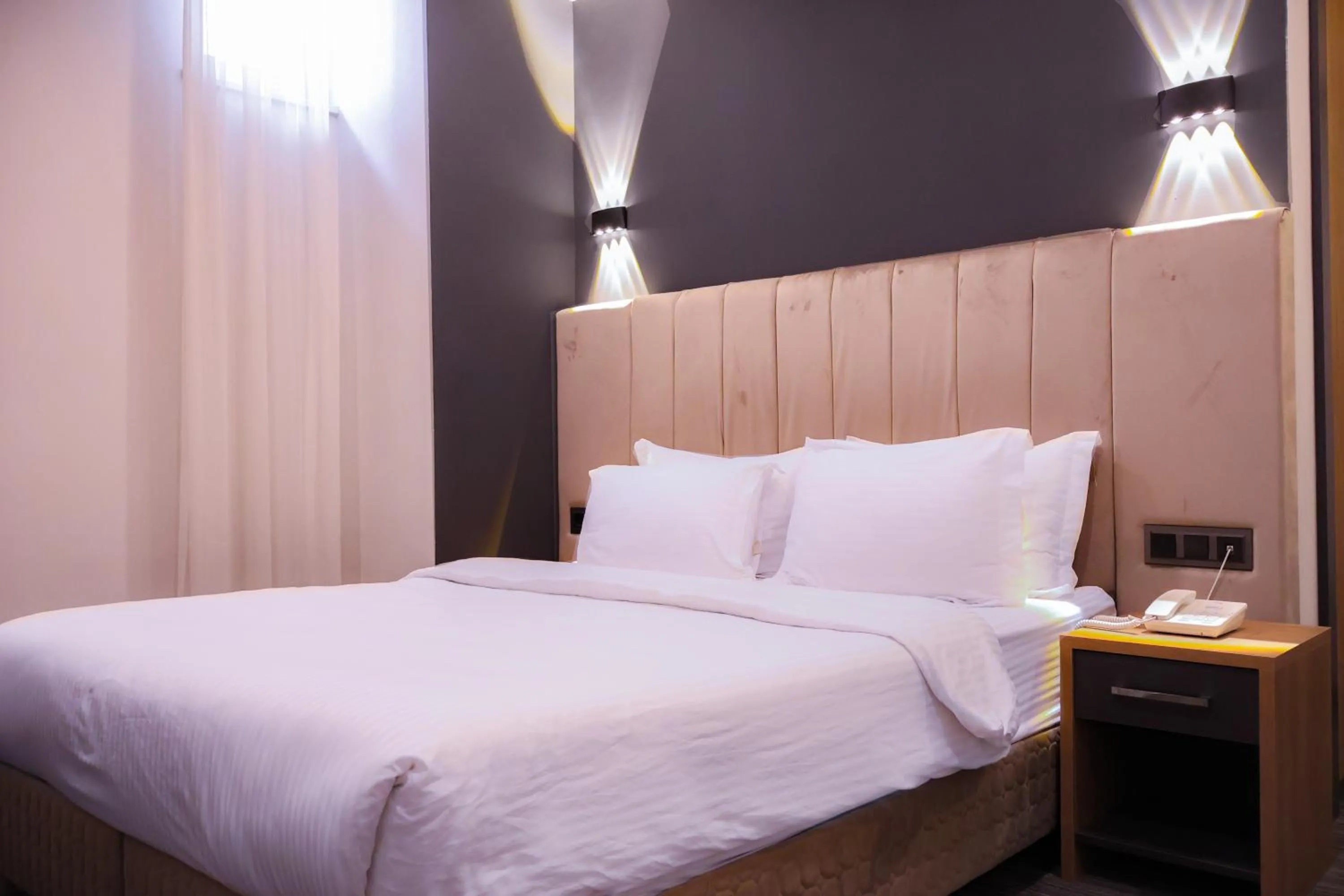 Photo of the whole room, Bed in HOME PLUS Hotel