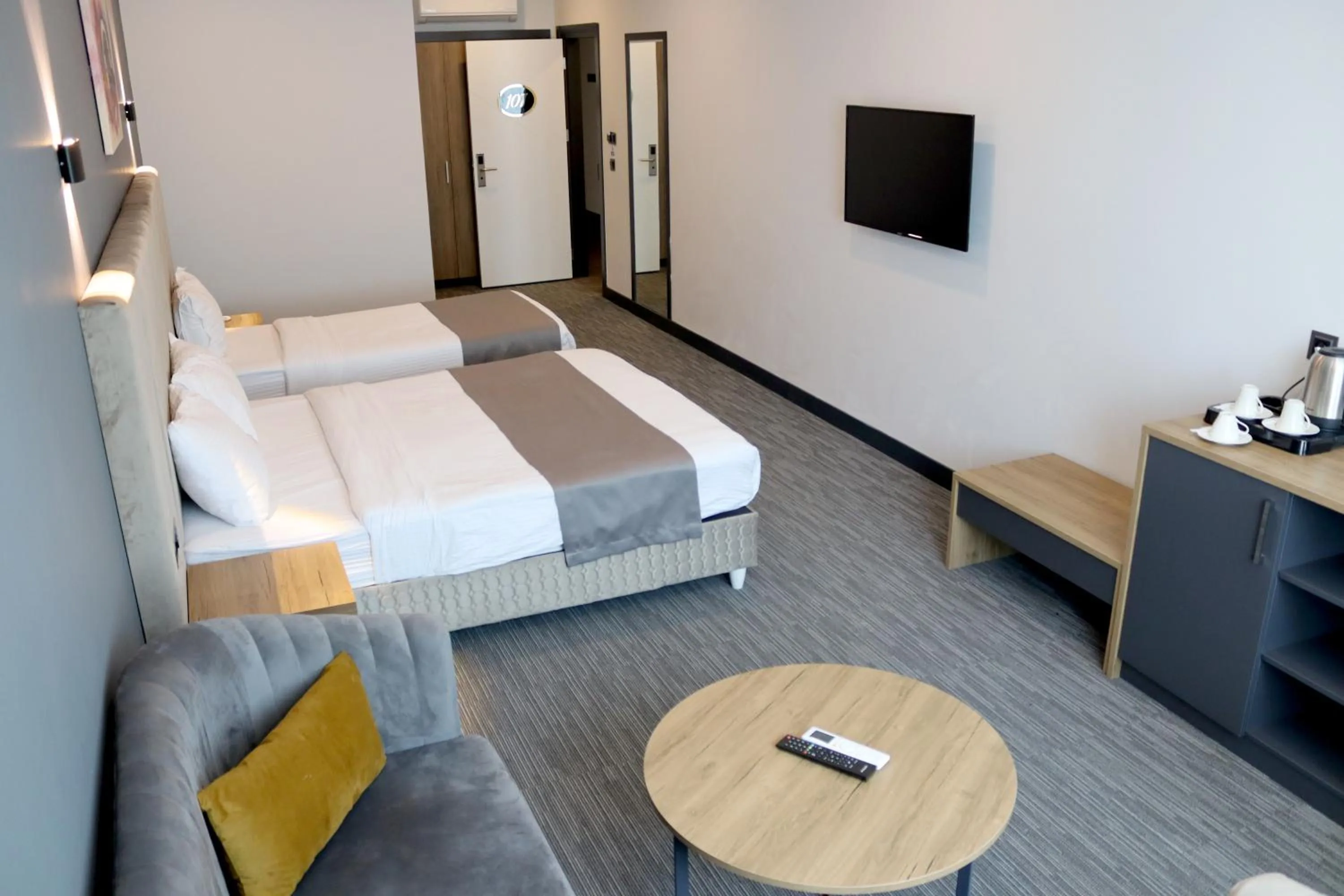 Dining area, Bed in HOME PLUS Hotel