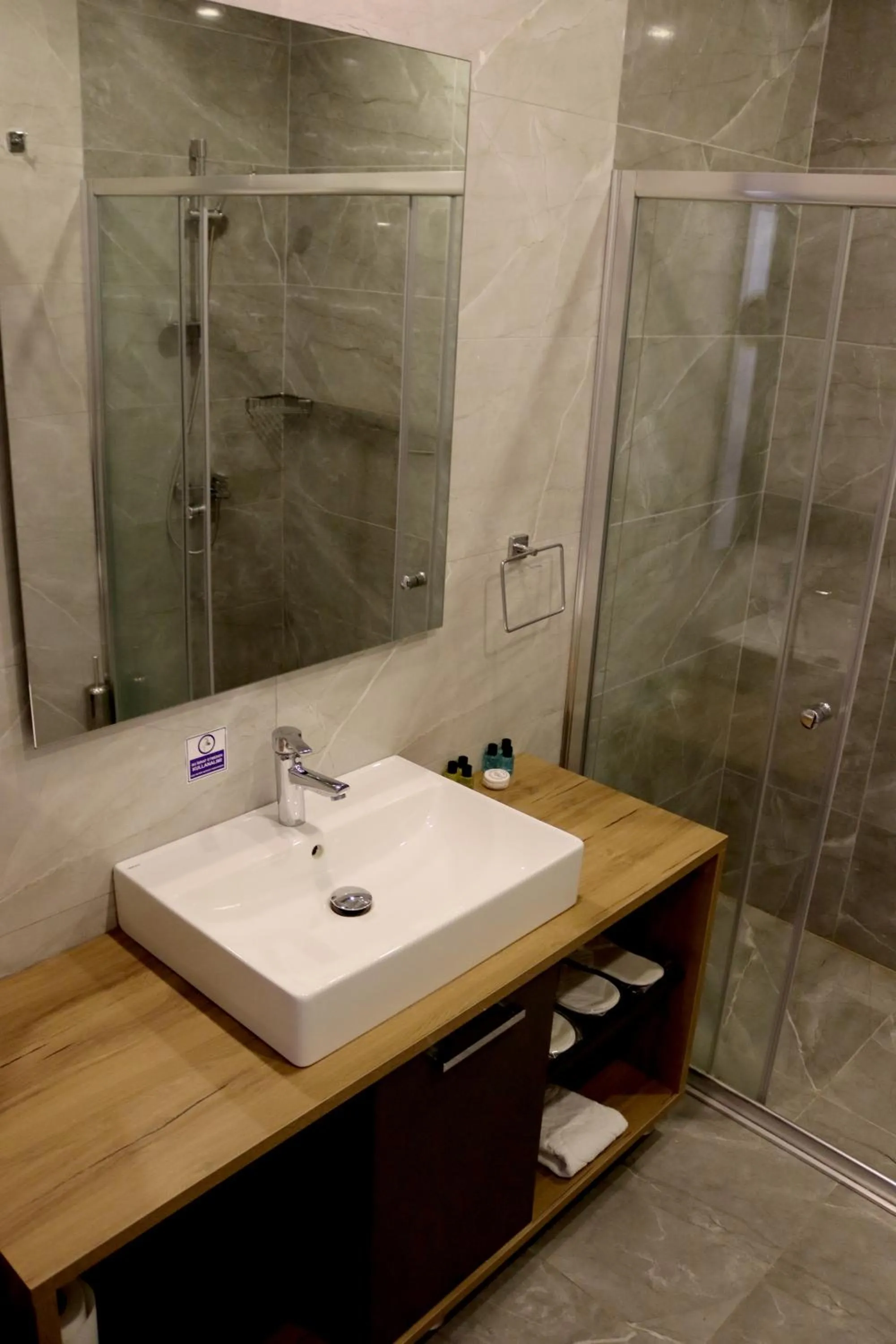 Bathroom in HOME PLUS Hotel