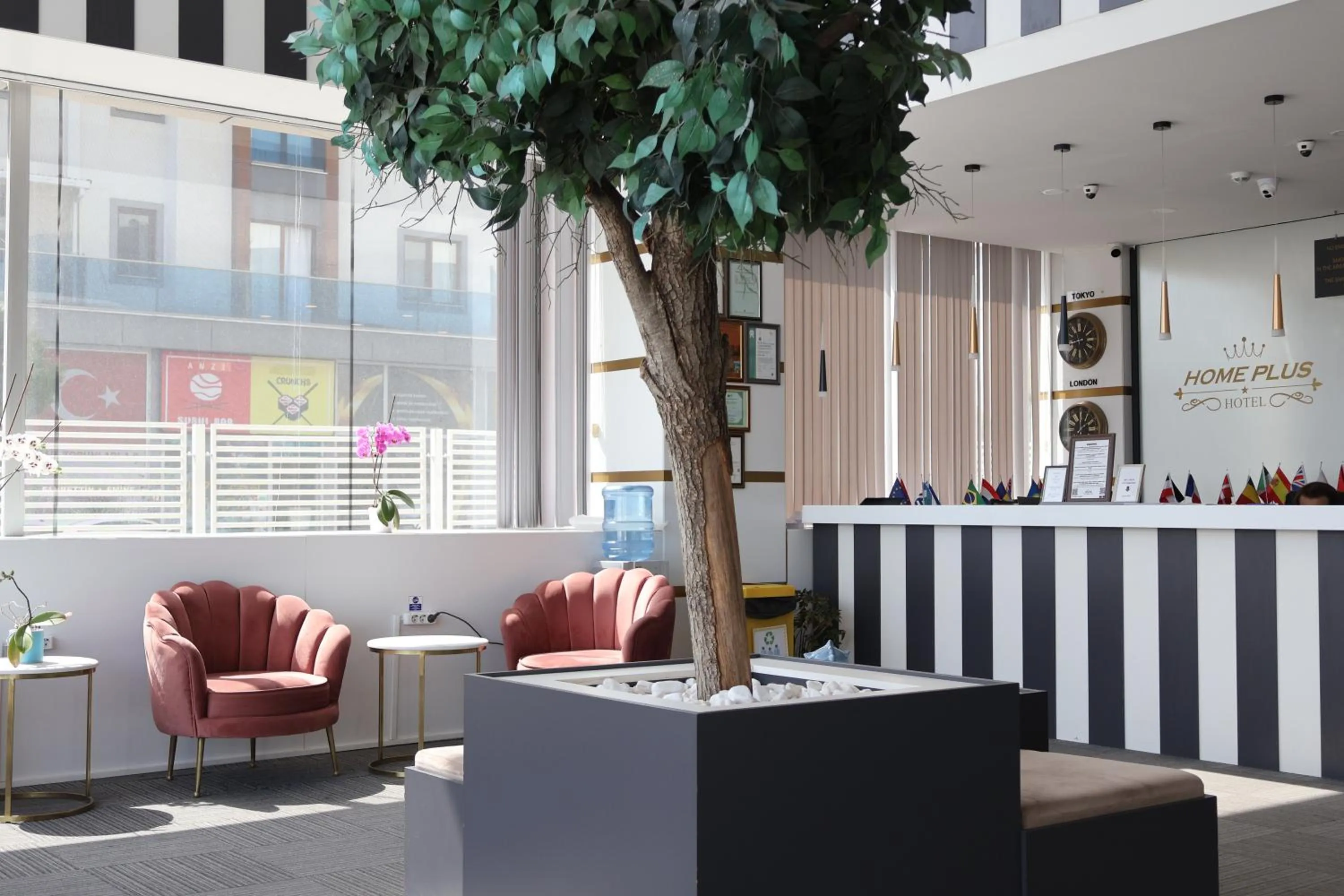 Lobby or reception in HOME PLUS Hotel