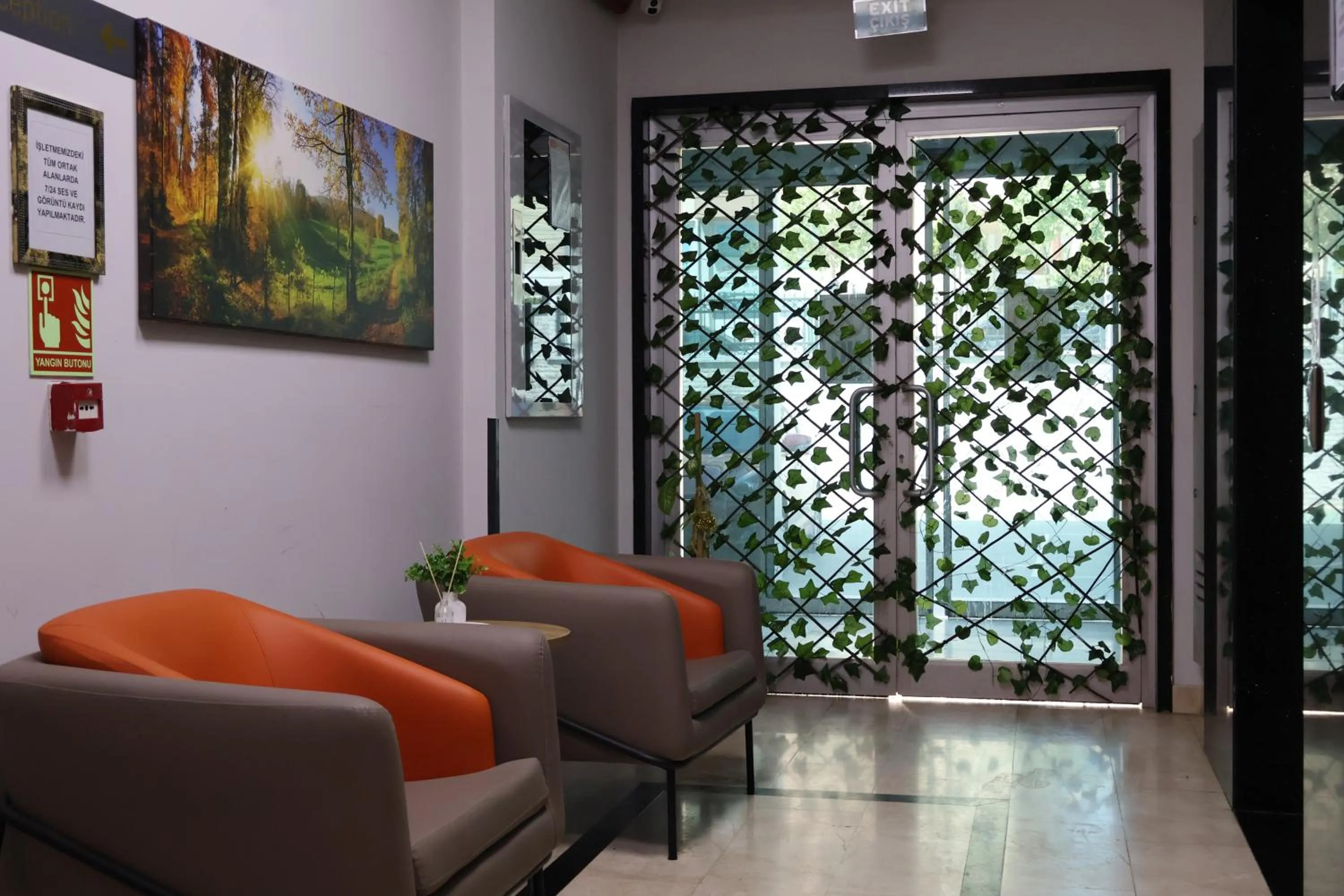 Lobby or reception in HOME PLUS Hotel