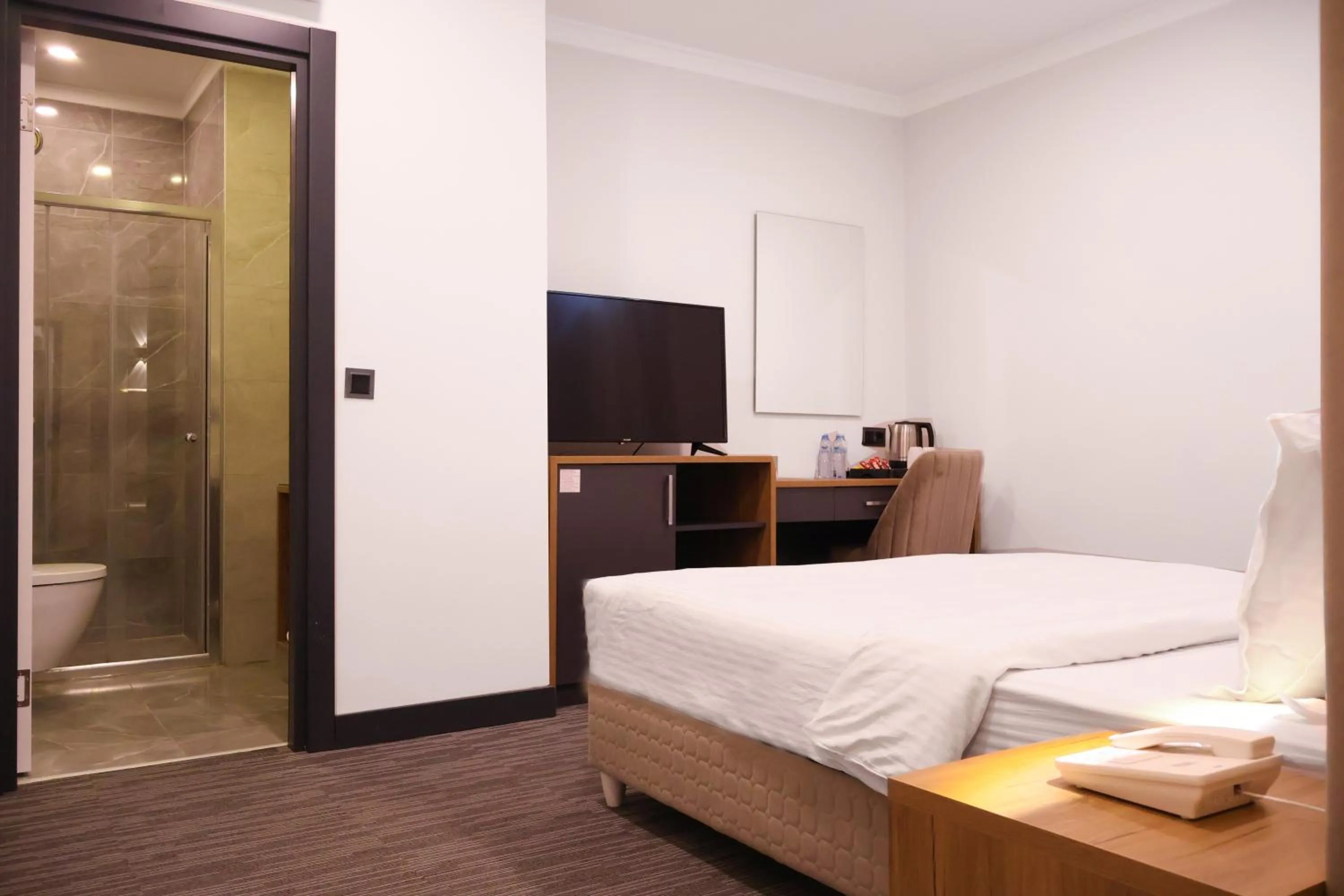 Bedroom, Bed in HOME PLUS Hotel