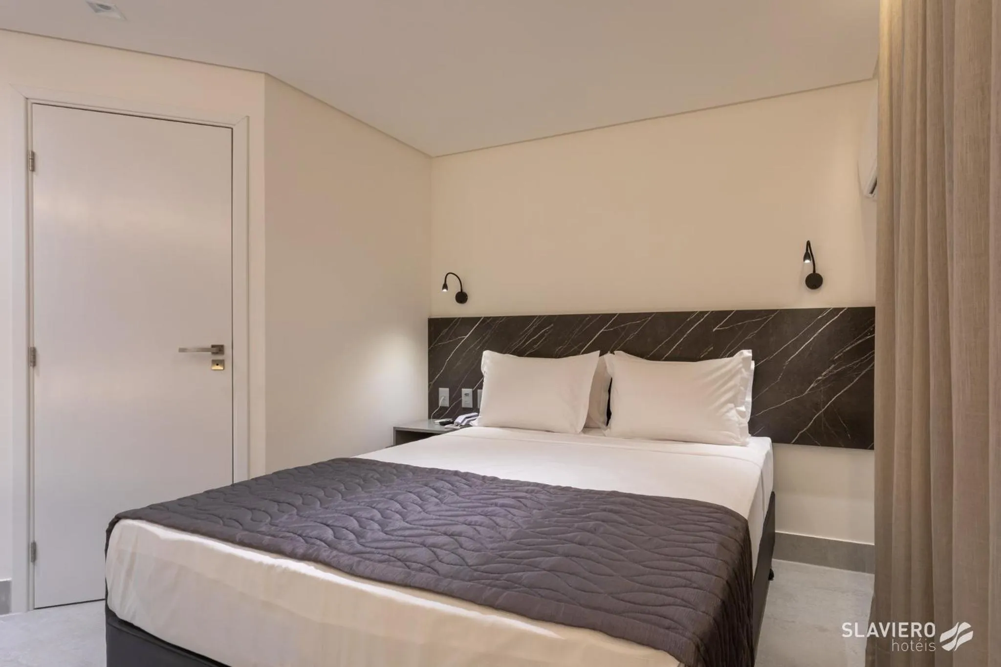 Bed in Slaviero João Pessoa