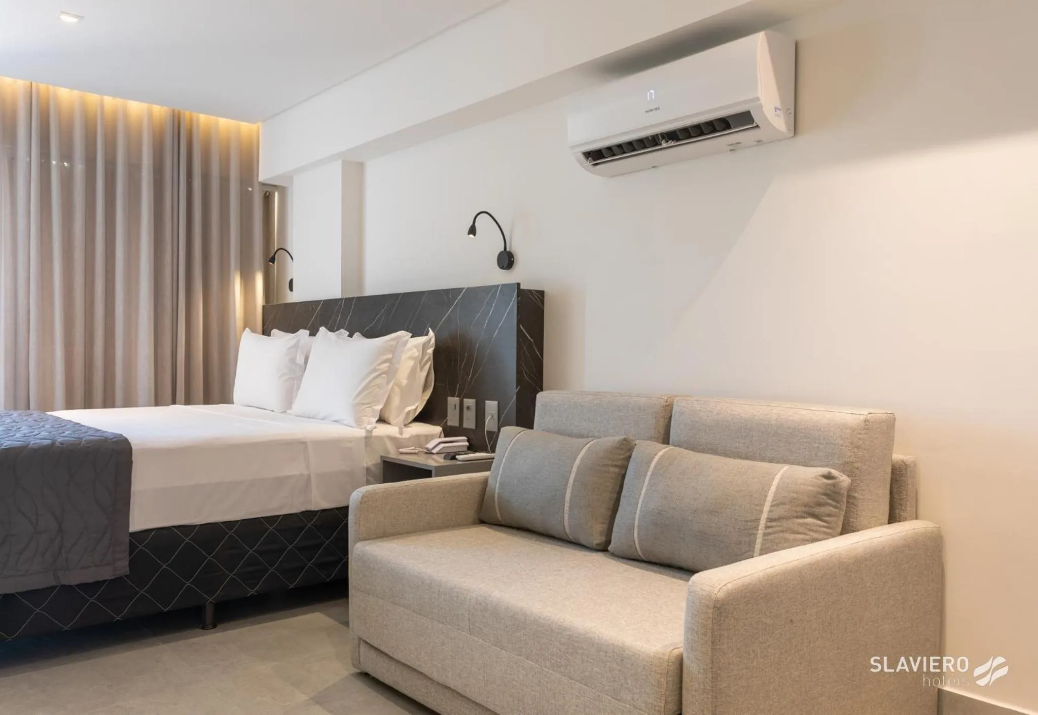 Bed in Slaviero João Pessoa