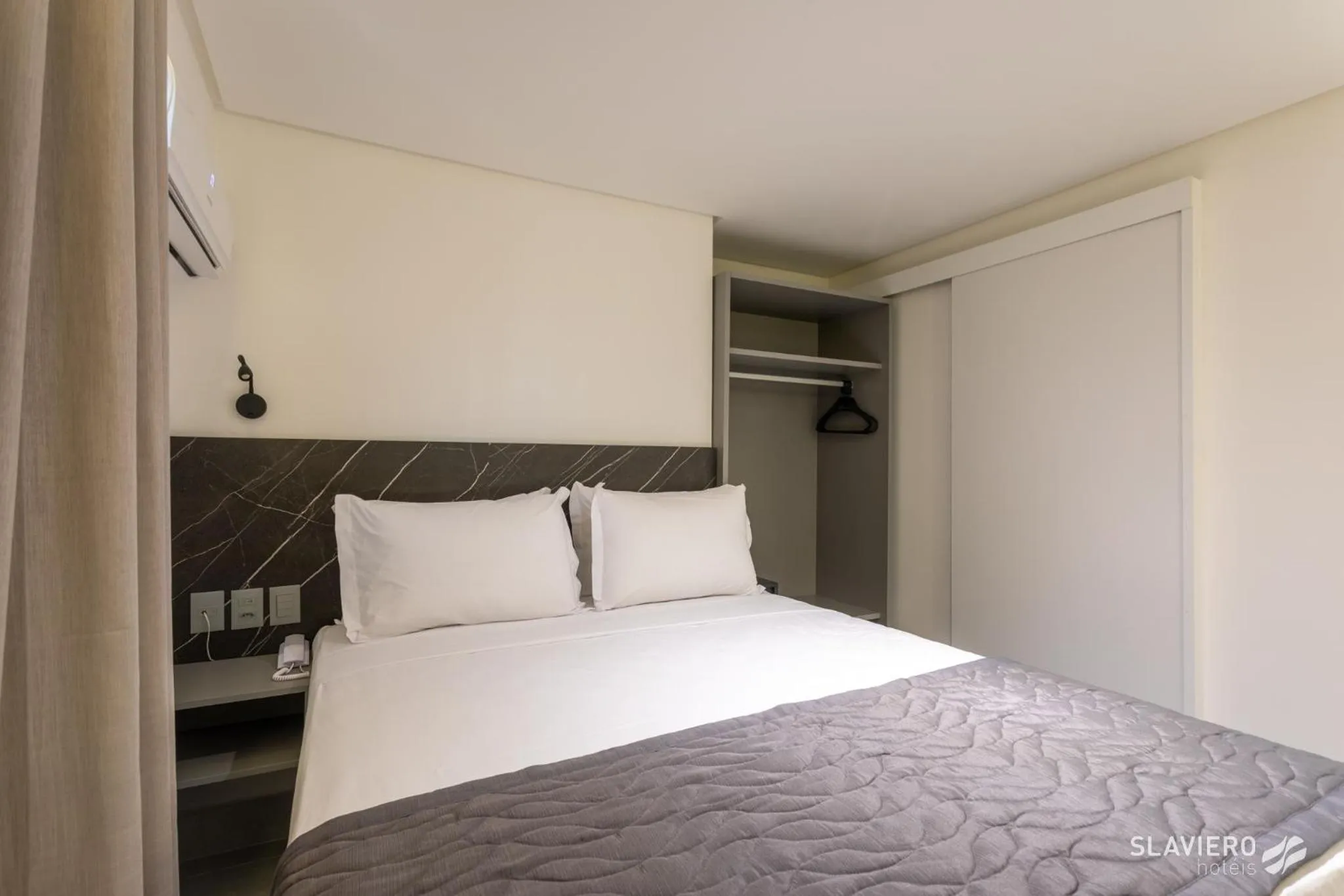 Bed in Slaviero João Pessoa