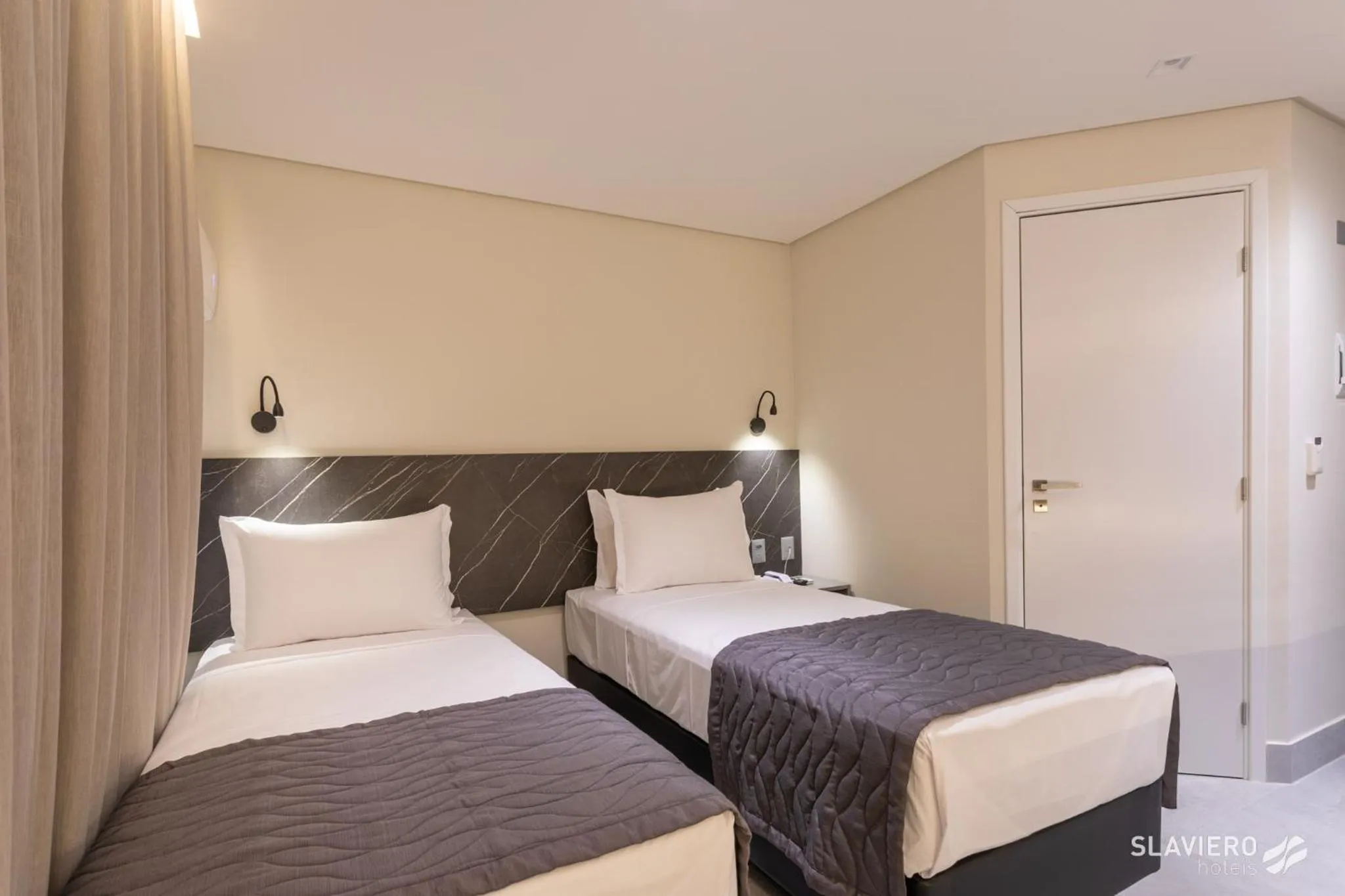 Bed in Slaviero João Pessoa