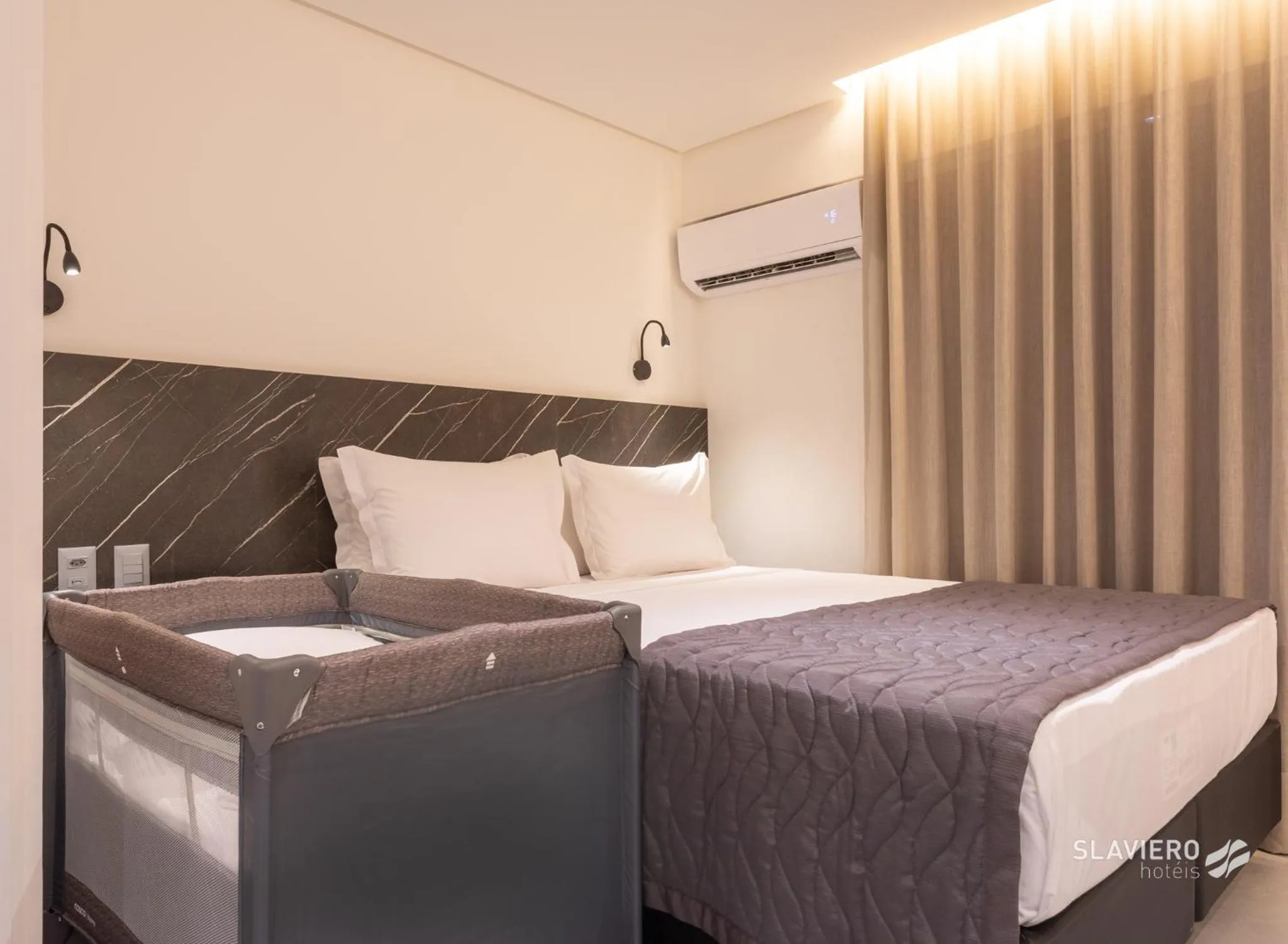 Bed in Slaviero João Pessoa