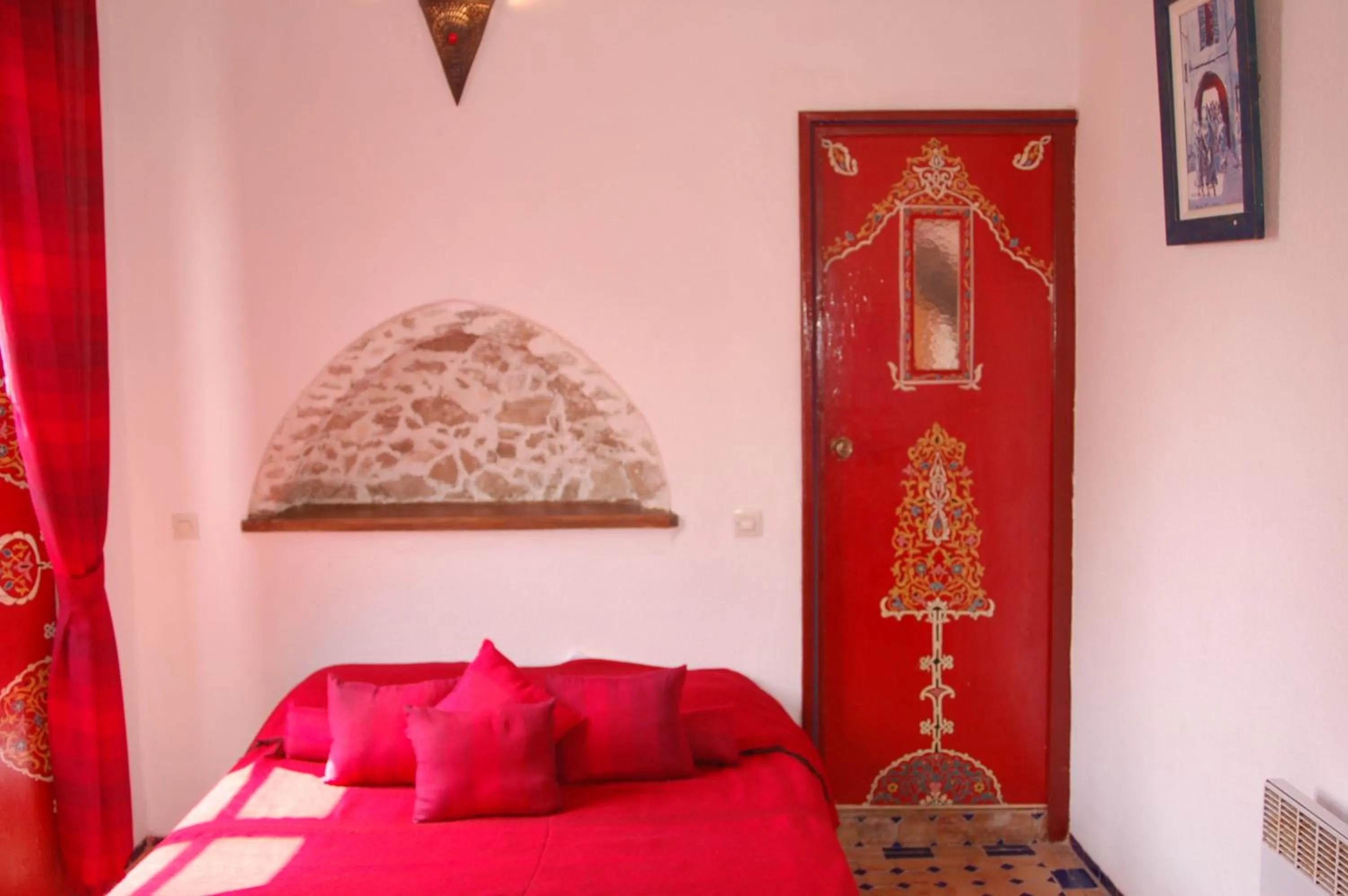 Bed in Riad Le Grand Large